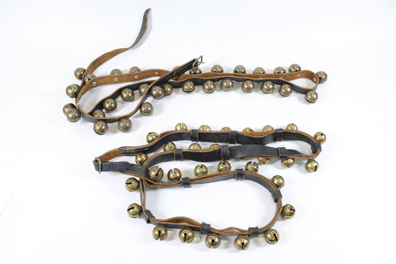 TWO STRAPS OF BRASS SLEIGH BELLS (1 of 3)