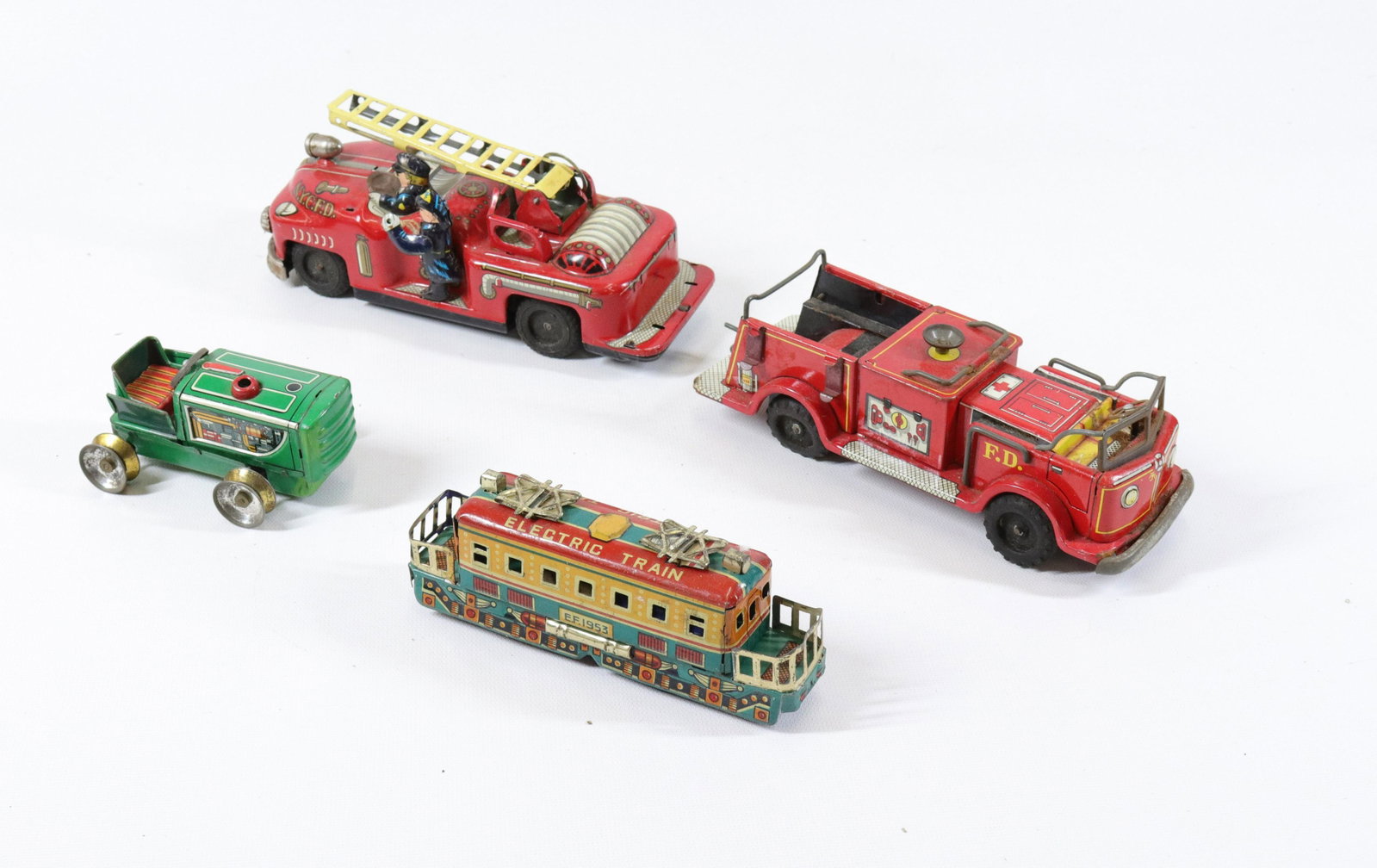 VINTAGE TIN JAPAN TOYS: (2) FIRE TRUCKS - ELECTRIC TRAIN AND TRACTOR