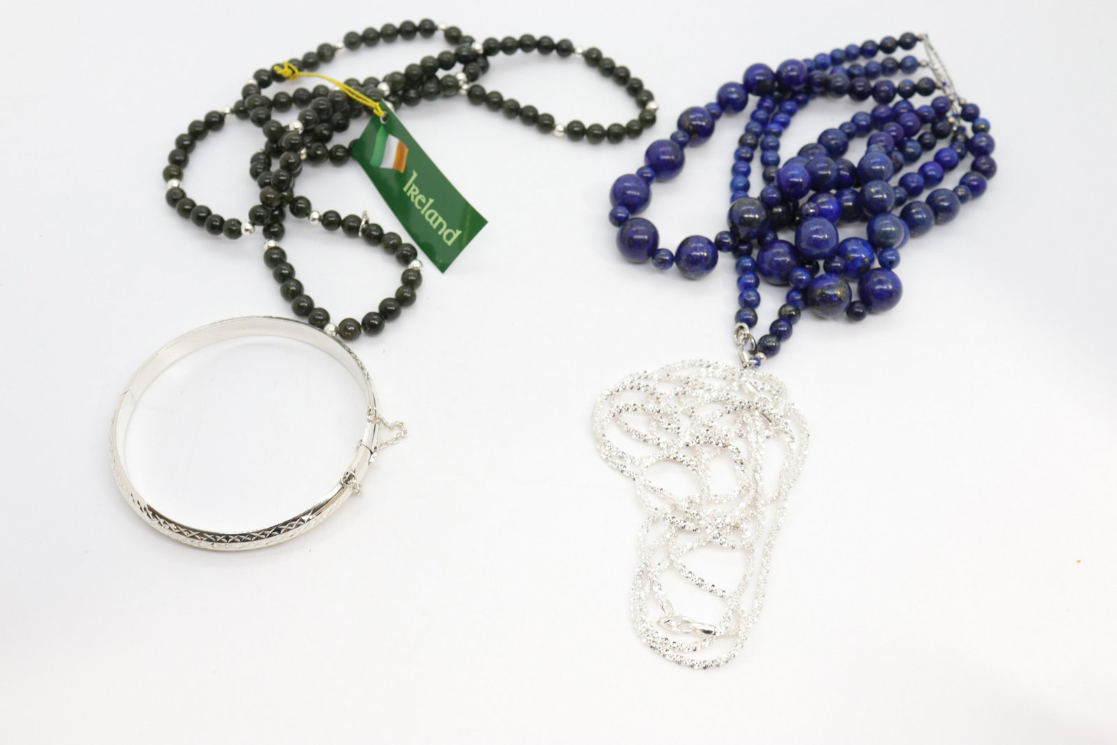 CONTEMPORARY JEWELRY LOT: NEW IN BOX - (5) PIECES INCLUDING - STERLING SILVER BANGLE, (2) STERLING SILVER CHAINS, LAPIS NECKLACE IN STERLING, CONNEMARA MARBLE IRISH STONE NECKLACE 28" - 20" - 22" - 18"