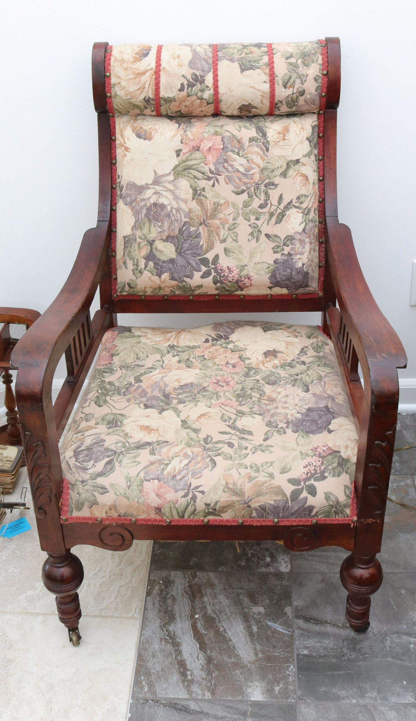 Antique (5) piece parlor set: Description: Parlor set with pressed leaf decoration in mahogany - settee, extra wide chair, (2) side chairs, and arm chair - upholstered with turned wooden legs on casters Condtion: Wear consistent w