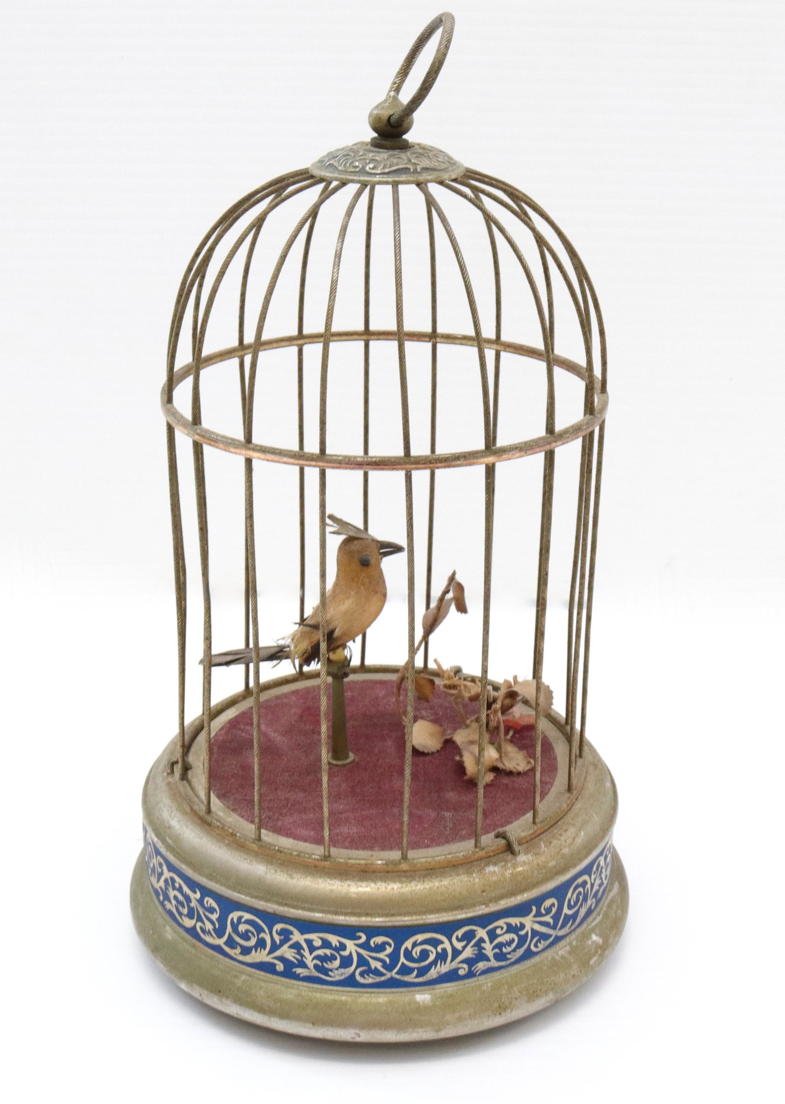 Vintage french brass automaton bird cage: Description: Keywind clock work mechanism marked with "s" - bird in cage that sings Condtion: Working order - good condition Size: 10 3/4" Consignor: JS Terms: This is an On-Site Online Only Aucti