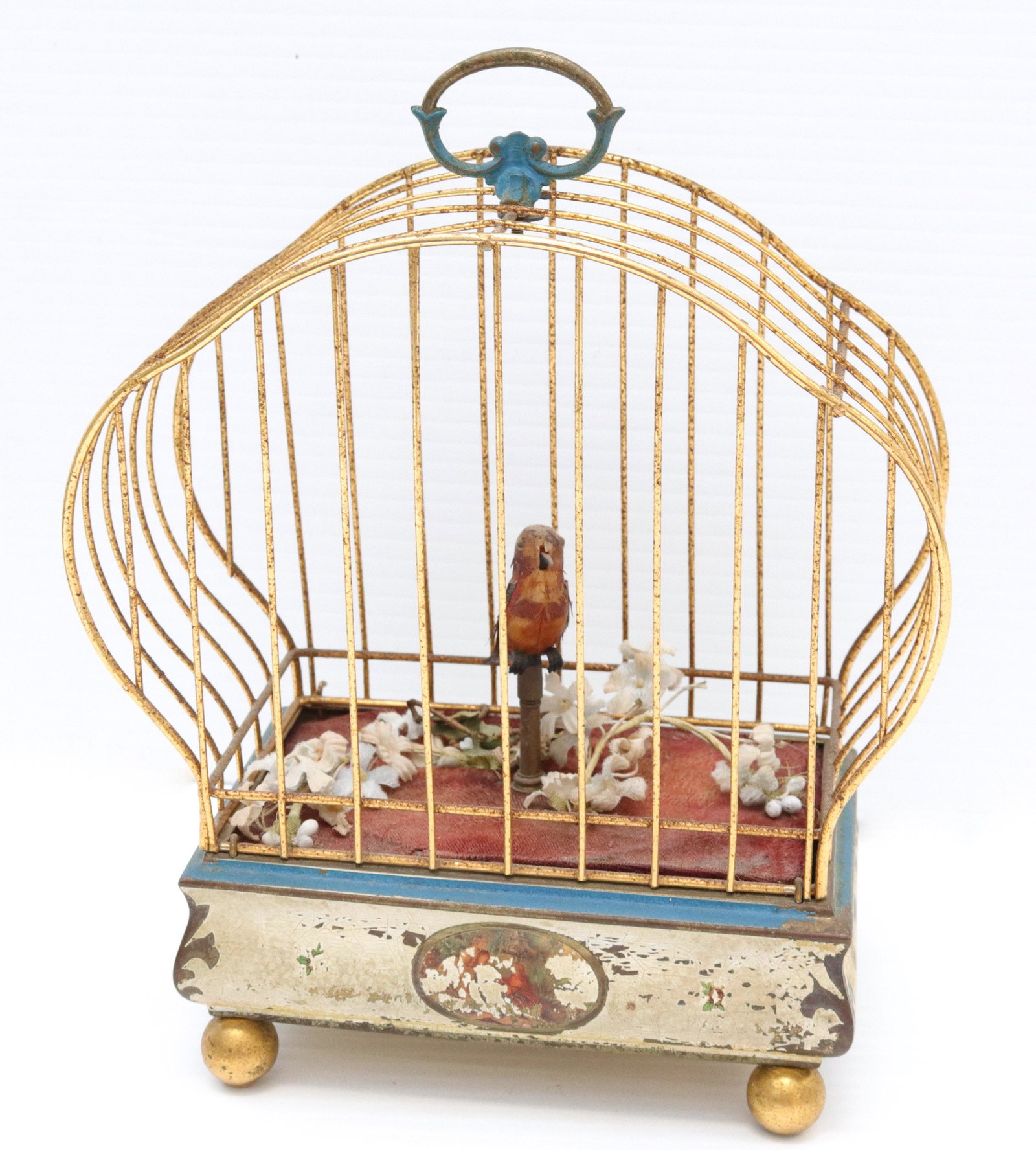 Vintage french brass automaton bird cage: Description: Keywind clock work mechanism - bird in cage that swivels back and forth Condtion: Does wind-up but birds do not move Size: 8" X 7 1/4" Consignor: JS Terms: This is an On-Site Online O