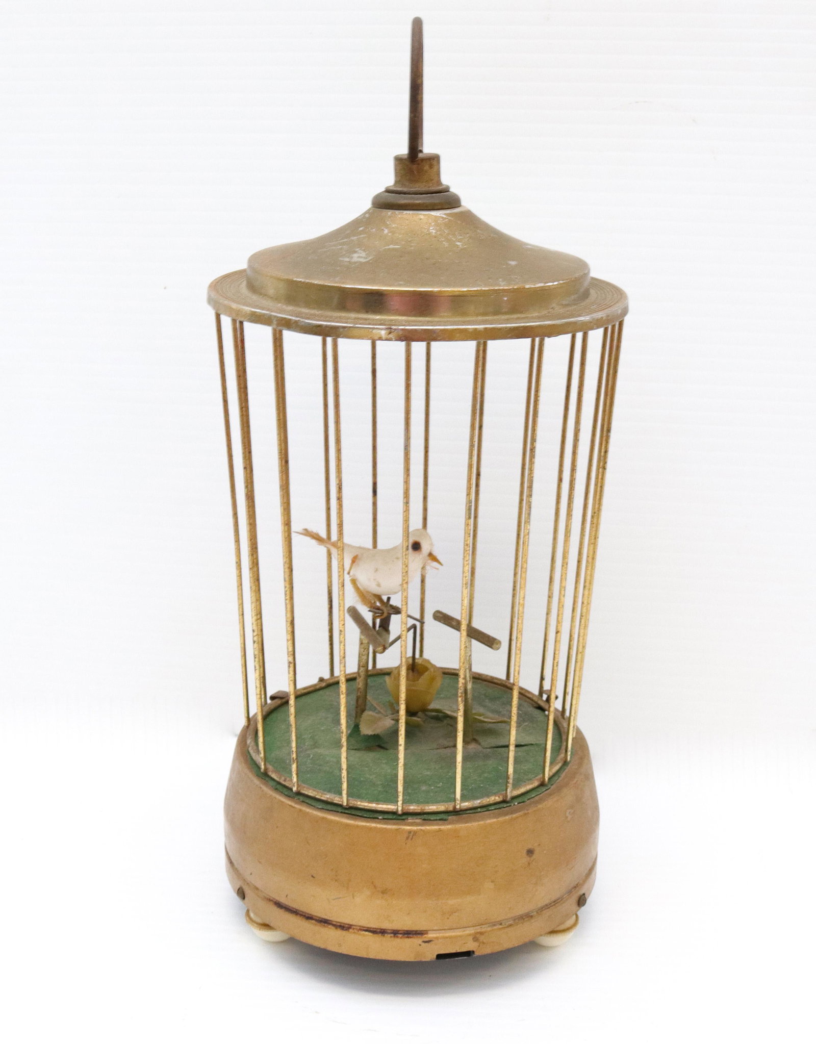 Vintage french brass automaton bird cage: Description: Keywind clockwork mechanism - bird hops from perch to perch Condtion: Missing one wire to cage and clamp - working order Size: 10 3/4" Consignor: JS Terms: This is an On-Site Online O