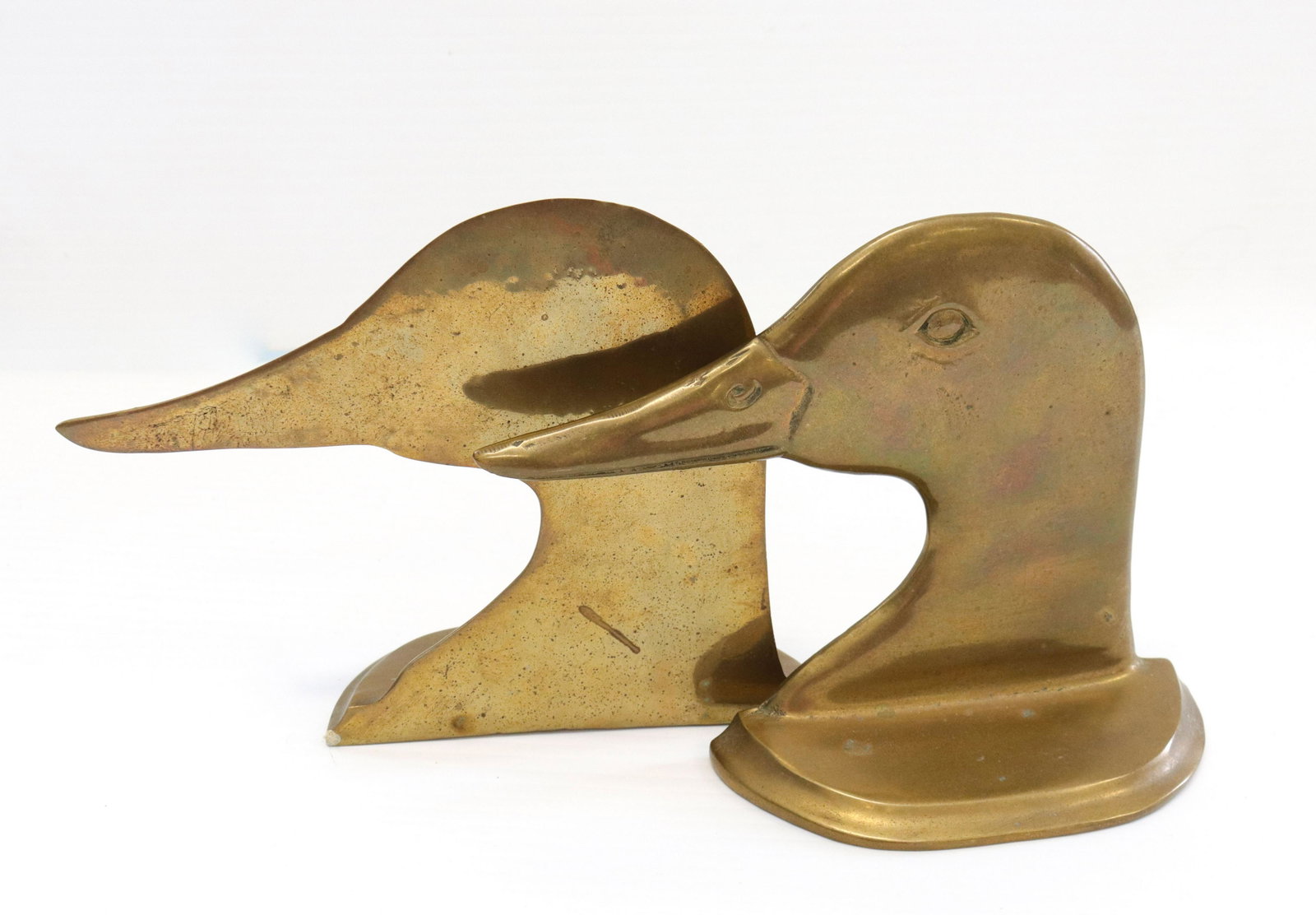 Pr. of brass duck bookends: Description: Good form Condtion: Good overall condition Size: 5" X 7" Consignor: JS Terms: This is an On-Site Online Only Auction. Preview Will Be (2) Days and you must Make an Appoinment to View