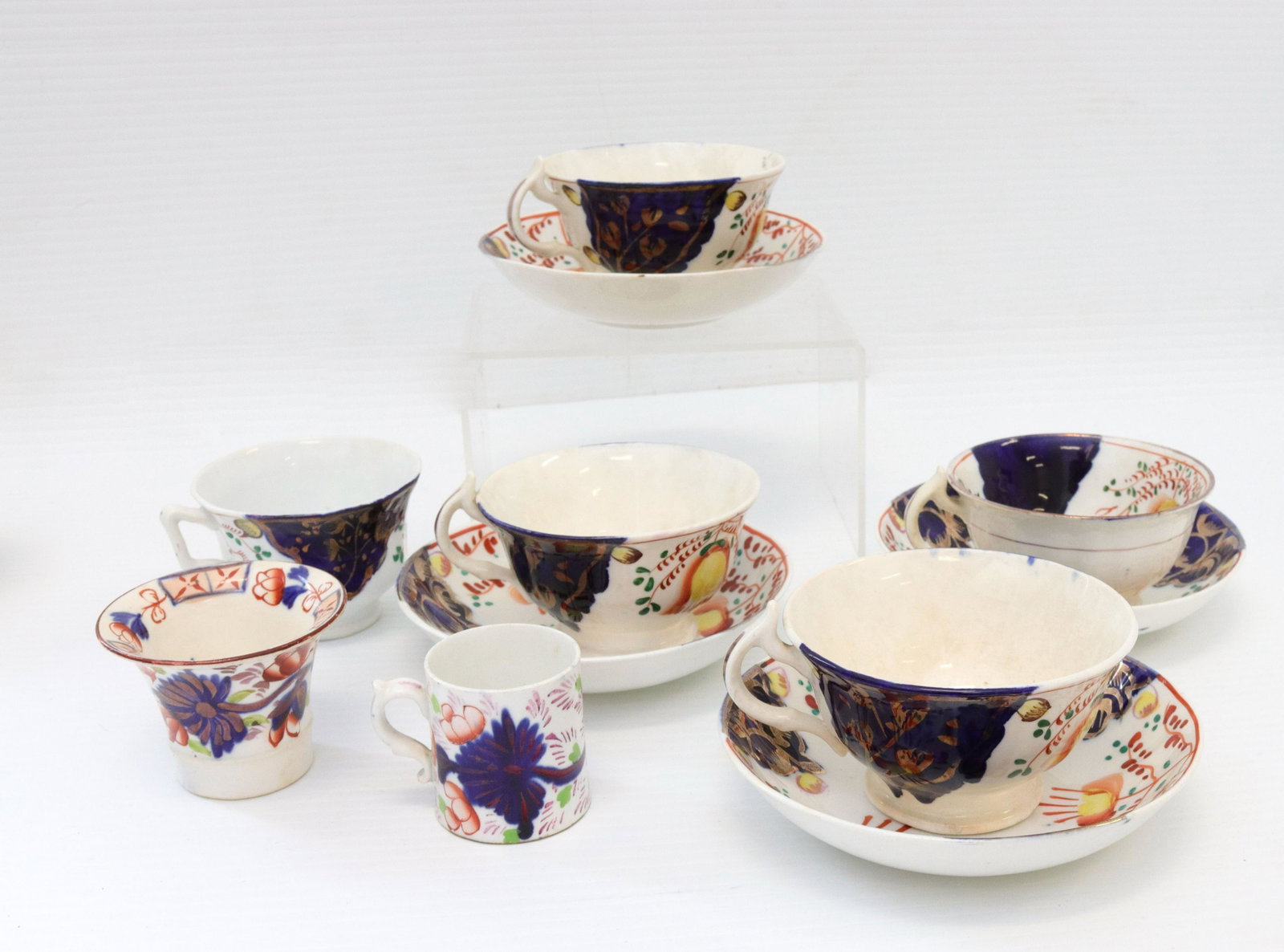 Lot of gaudy welsh porcelain: Description: (11) pieces including - (4) saucer, (4) 4 cups, single cup, miniature mug, and miniature pot Condtion: As is with some wear and hairlines Size: Consignor: JS Terms: This is an On-Site O