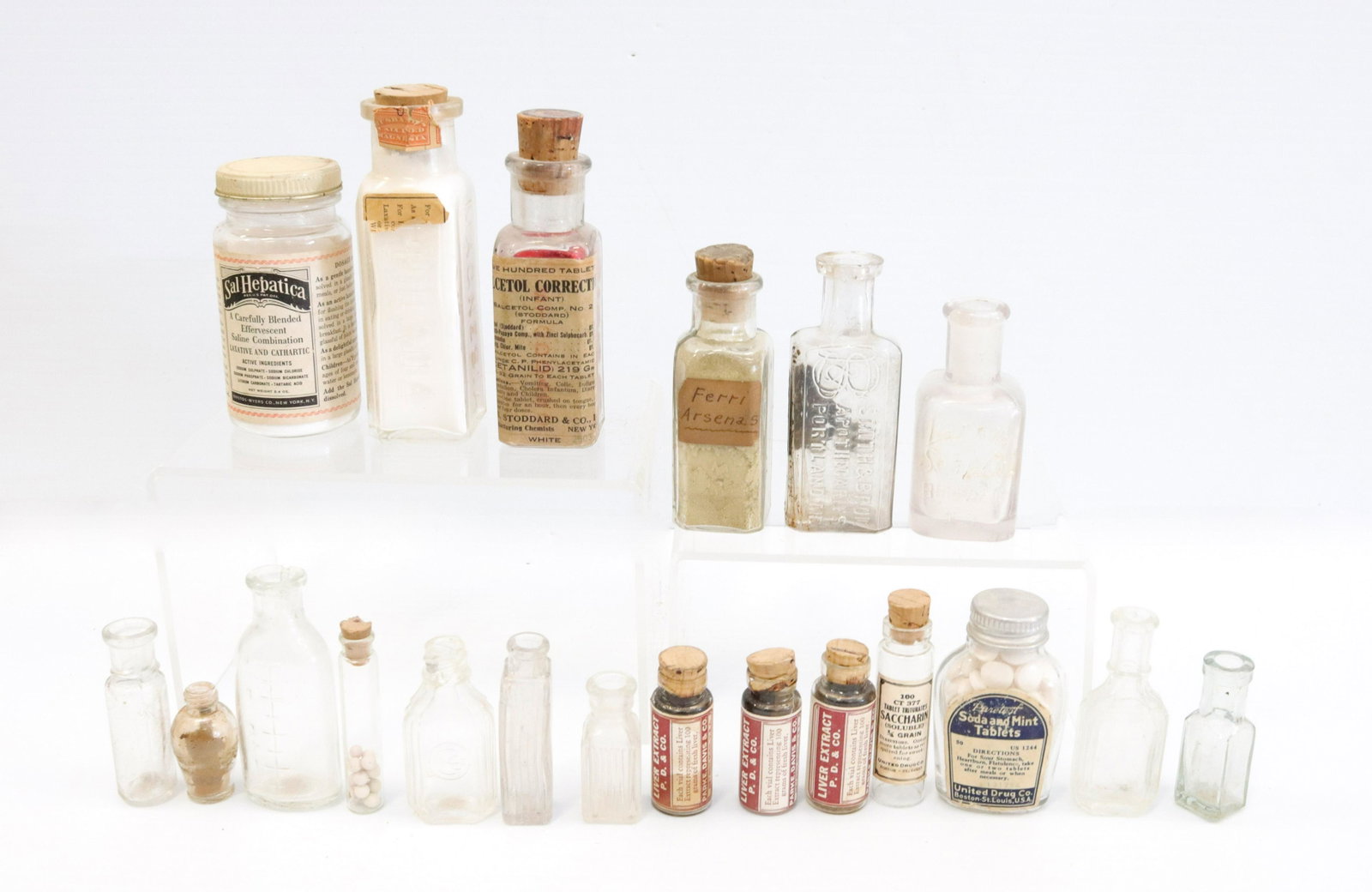 Group lot of vintage medical bottles: Description: (20) bottles - some with original paper labels Condtion: Wear consistent with age and use Size: 1 1/4" TO 4" H Consignor: JS Terms: This is an On-Site Online Only Auction. Preview Wil