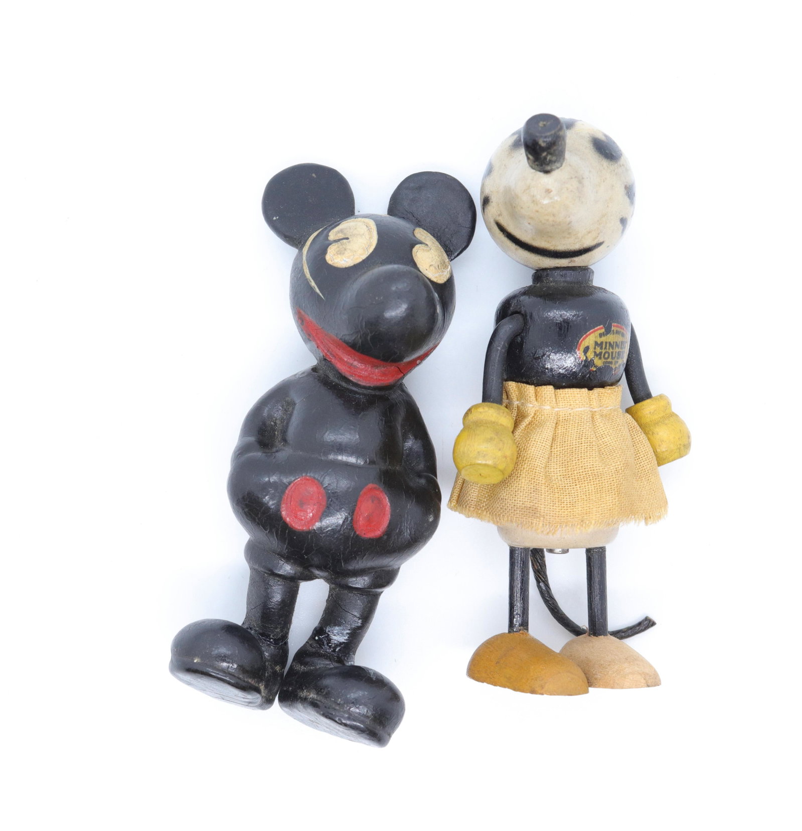 Vintage mickey and minnie mouse figures: Description: Minnie mouse is painted wood and jointed (fun-e-flex) - mickey mouse is painted molded rubber by; seiberling 1930's Condtion: Mickey is missing tail - minnie is missing ears Size: 3 1/2" 