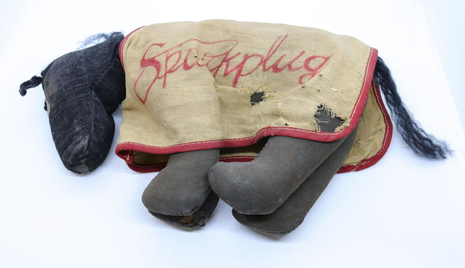 spark plug the donkey: Description: Barney google's donkey - cloth body with yarn tail - moveable head - straw stuffed Condtion: Overall wear and losses Size: 10" L Consignor: JS Terms: This is an On-Site Online Only Auc