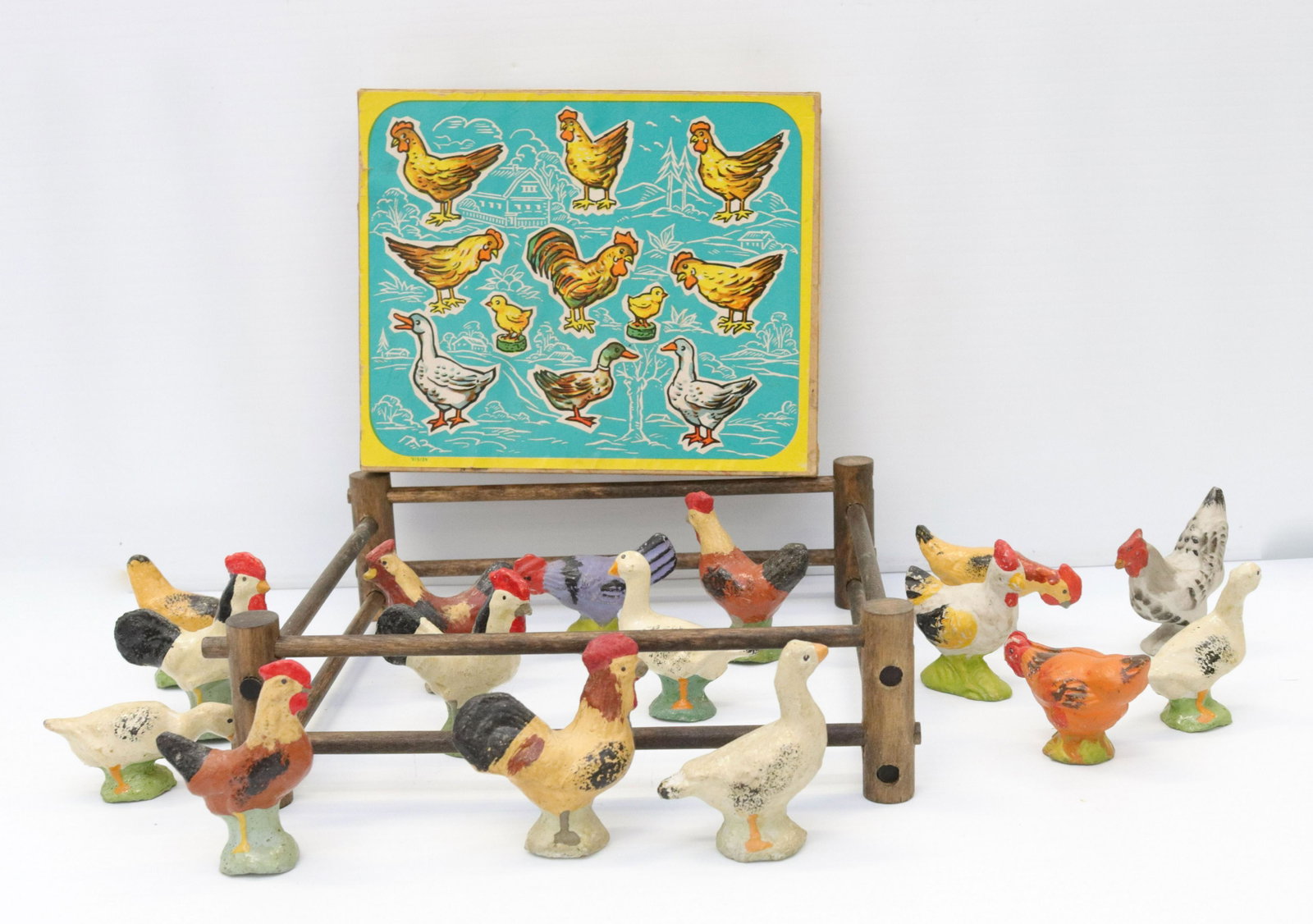 Group lot of miniature geese and chickens: Description: Most are painted composition. some stamped "germany". in box. wooden fence. Condtion: Good. normal wear Size: TALLEST 2 1/2" H Consignor: JS Terms: This is an On-Site Online Only Auc