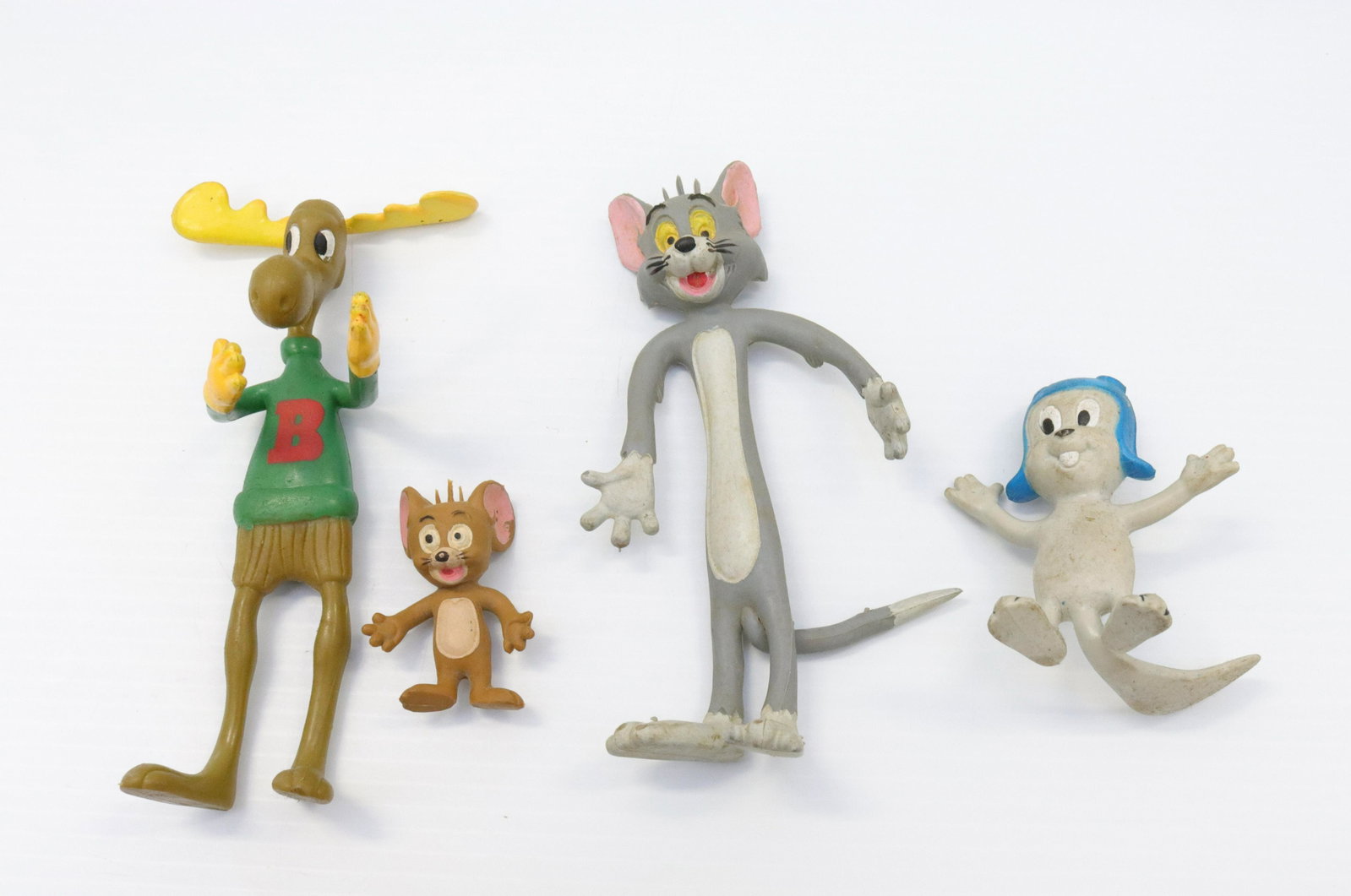 Group lot of rubber cartoon characters: Description: Four including: tom, jerry, bullwinkle and rocky the squirrel Condtion: Normal wear from age and use Size: 2 1/4" TO 6 1/2" H Consignor: JS Terms: This is an On-Site Online Only Auction