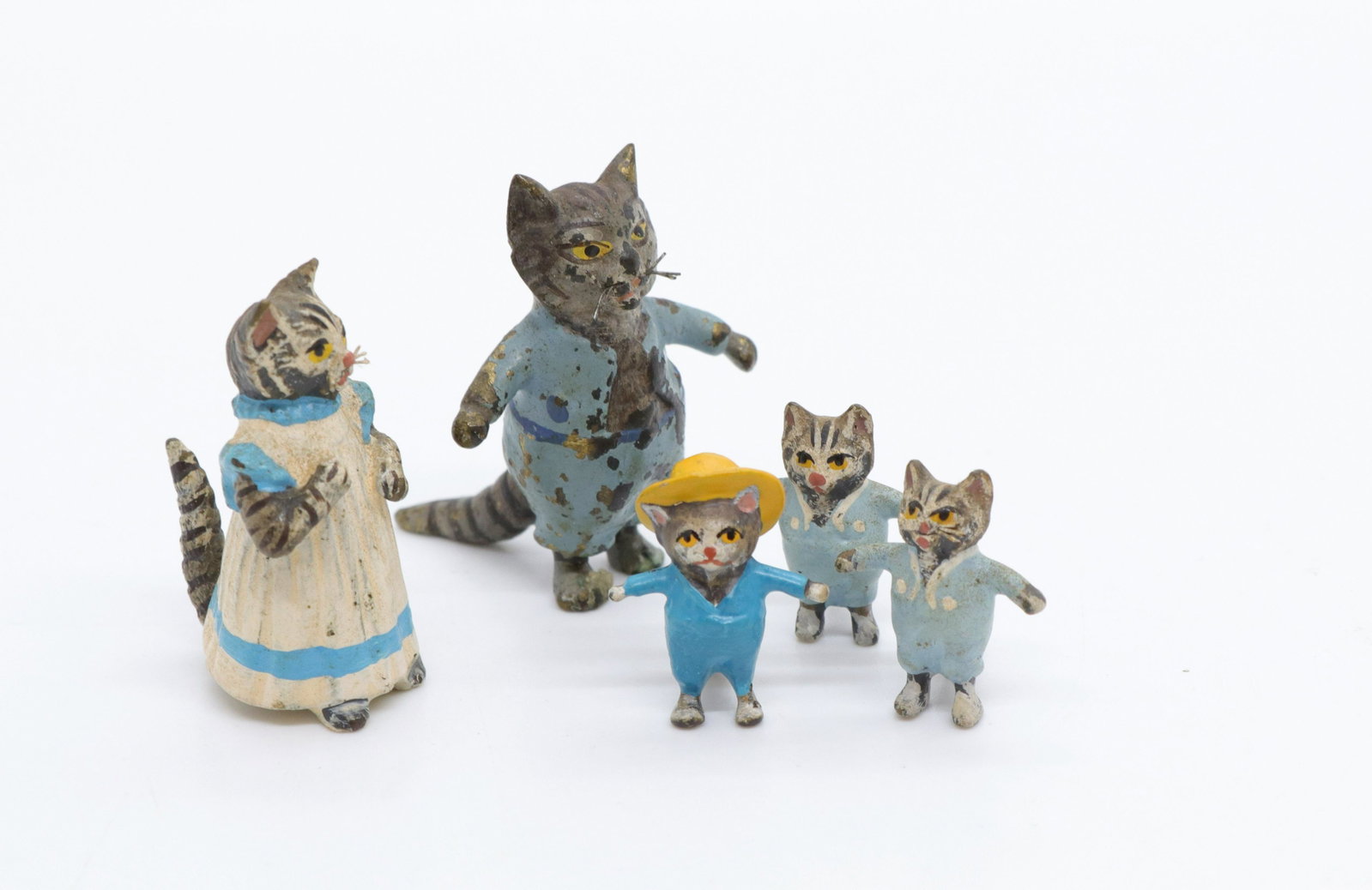 Vienna bronze cat lot: Description: Vintage miniature tabby cats in pajamas - beatrix potter Condtion: Some paint loss Size: 3/4" TO 1 1/4" Consignor: JS Terms: This is an On-Site Online Only Auction. Preview Will Be (2