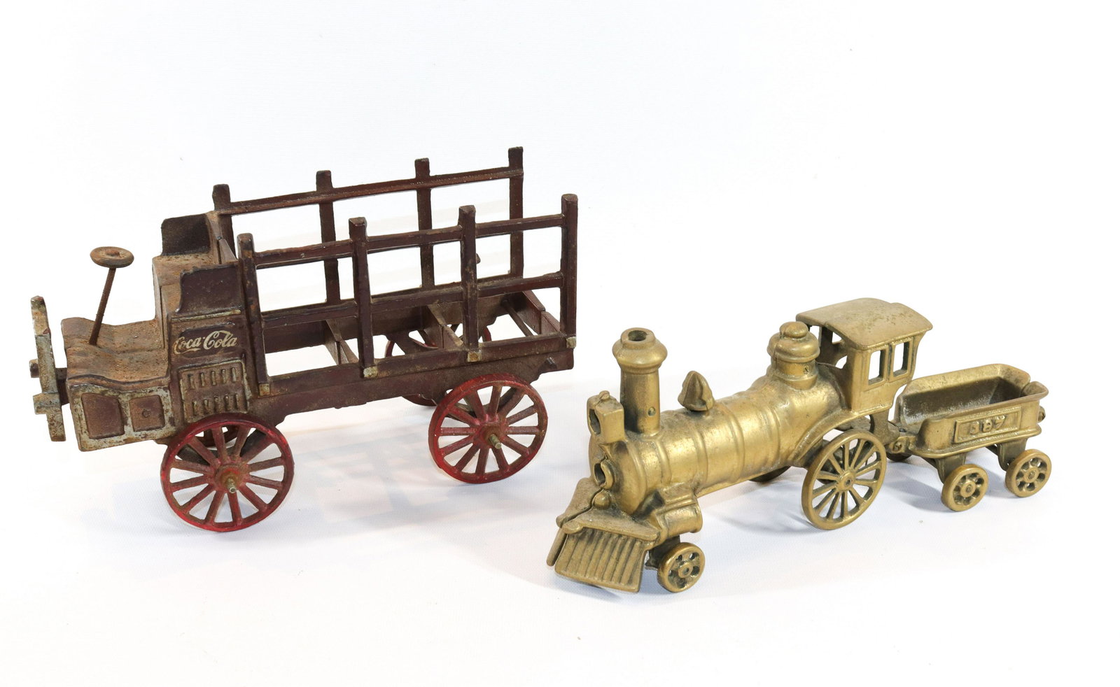 CAST IRON COCA COLA TRUCK AND BRASS TRAIN: PAINTED SURFACE. TRAIN IS ALL BRASS Size 11" L