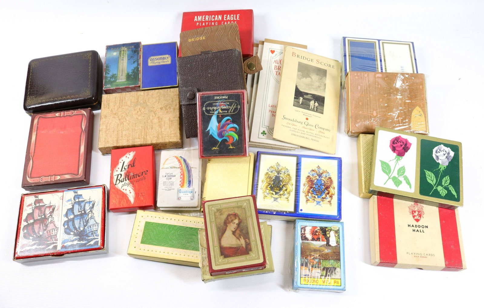GROUP LOT OF VINTAGE PLAYING CARDS: (20+) PACKS. ALSO, BRIDGE SCORE BOOKLETS