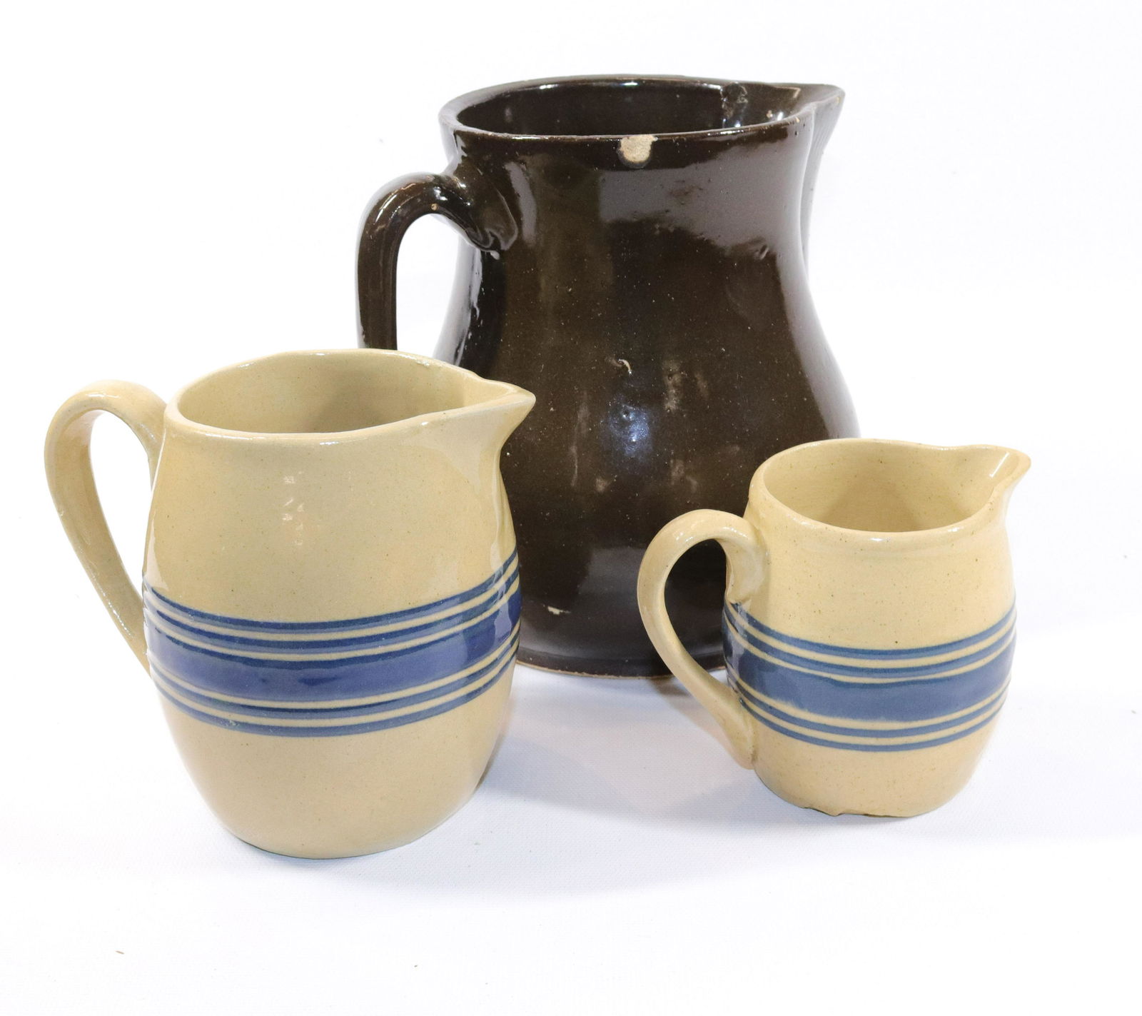 GROUP OF POTTERY PITCHERS (1 of 3)