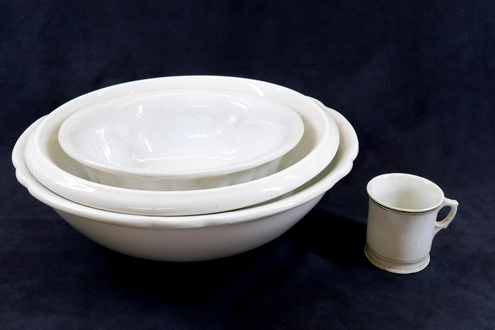 GROUP LOT OF IRONSTONE: (4) INCLUDING: THREE BOWLS AND SMALL MUG Size 10 1/2" TO 15" D