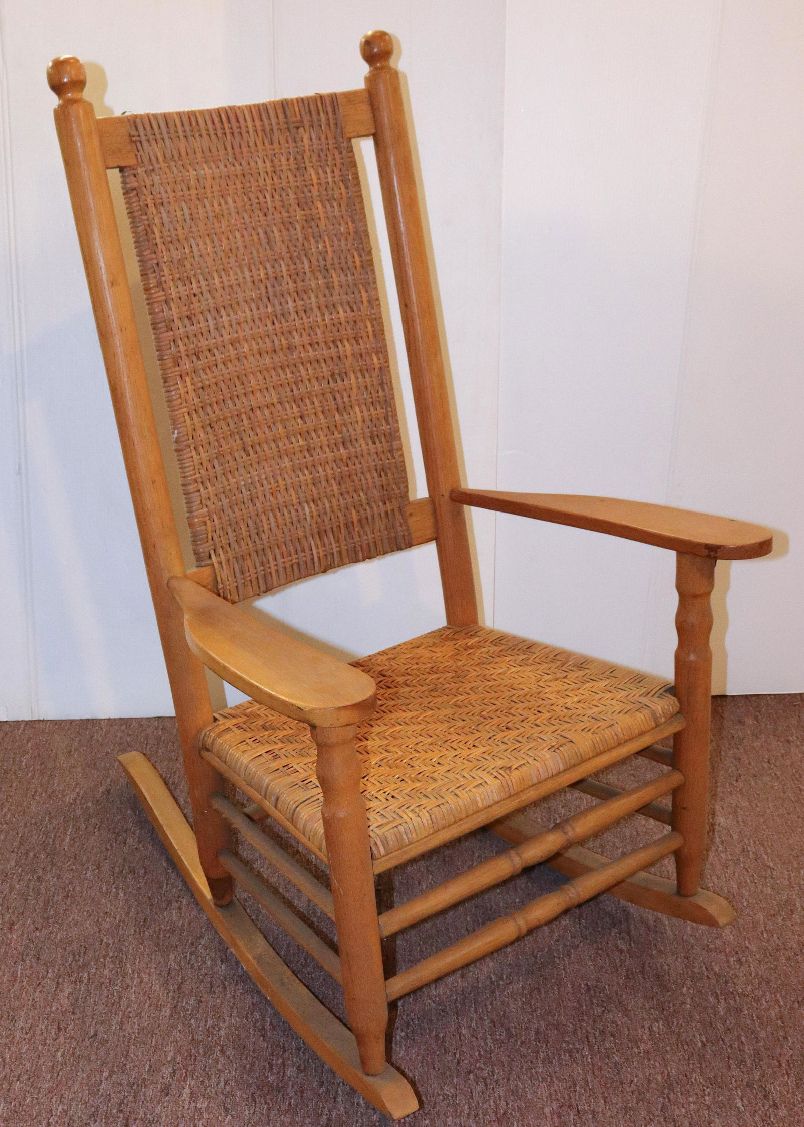 WOODEN ROCKING CHAIR: CANED SEAT. NATURAL WOOD Size 44" X 28" X 16"