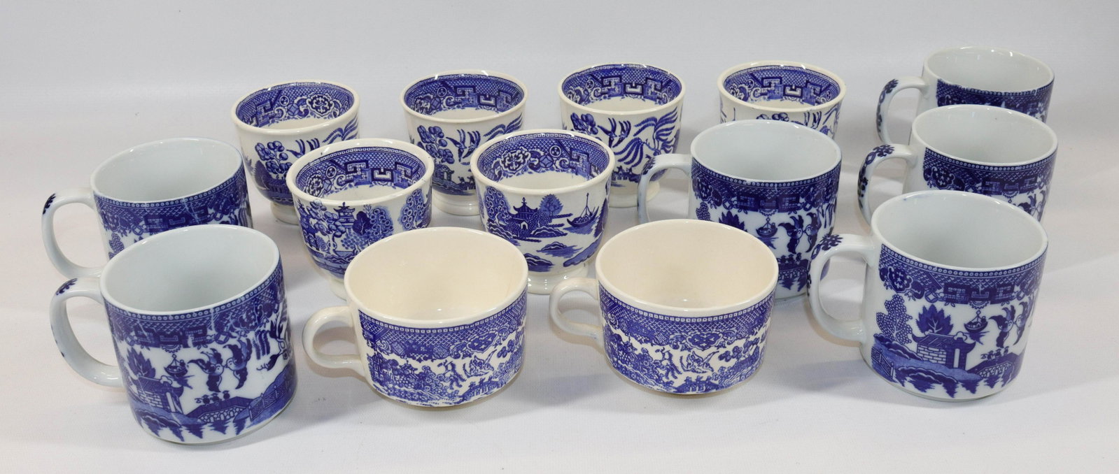 GROUP LOT OF BLUE/WHITE WILLOW WARE: INCLUDING: (8) HANDLE CUPS AND (6) HANDLELESS CUPS Size 2 1/2" TO 3 1/4" H