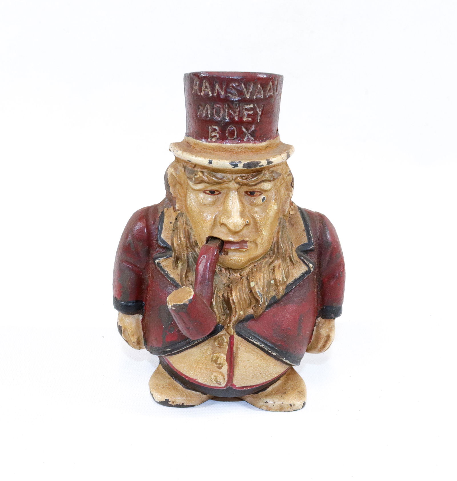 CAST IRON STILL BANK: RANSVAAL MONEY BOX - PAINT DECORATED FIGURE WITH ORIGINAL TRAP ON BOTTOM SIZE: 5 1/2" H