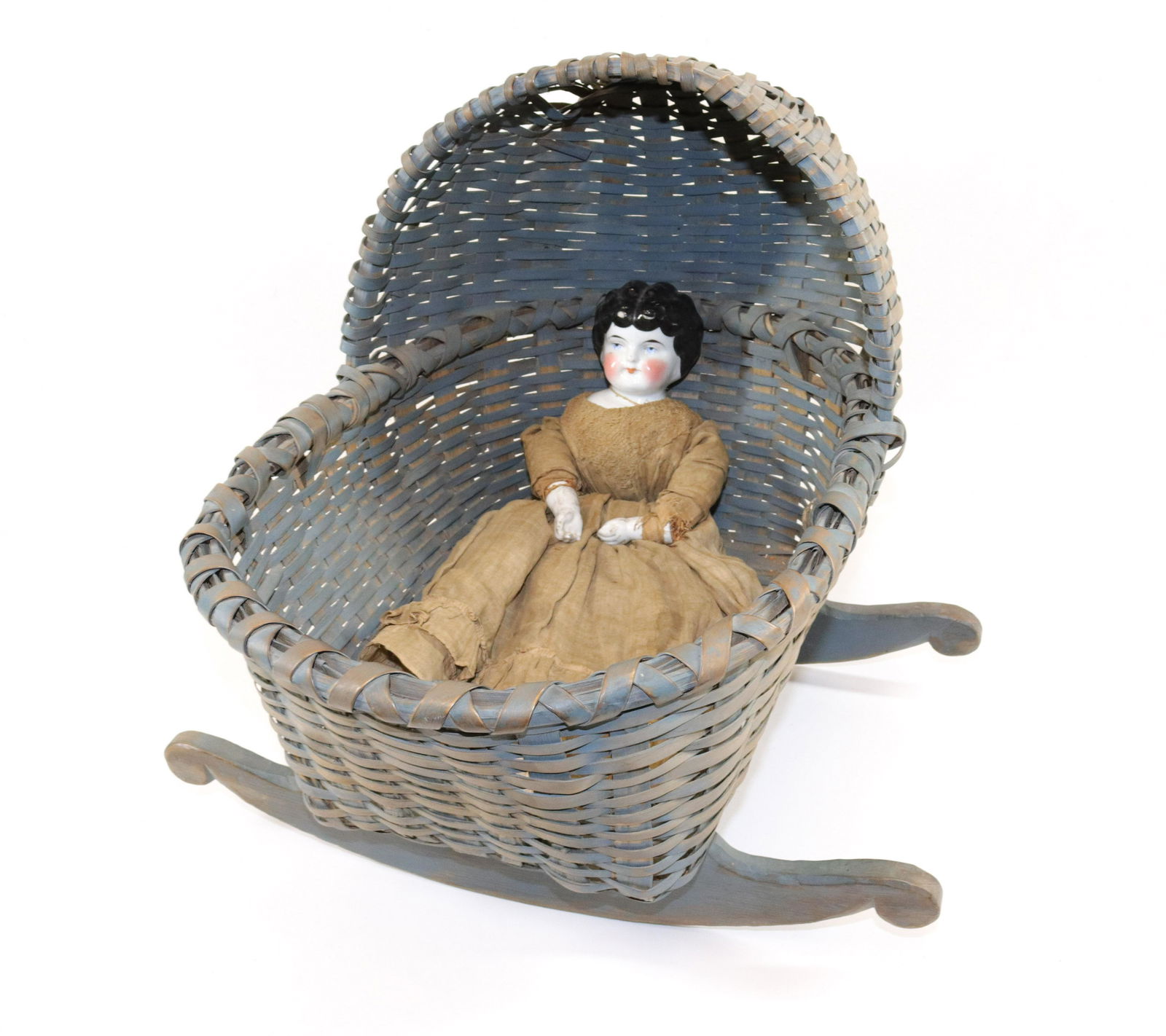 PORCELAIN DOLL WITH PAINTED DOLL CRADLE: PAINTED PORCELAIN DOLL WITH MOLDED HANDS AND FEET (SAW DUST FILLED) - ROCKER IN LIGHT BLUE PAINT SIZE: DOLL 18" L - CRADLE 15" X 17 1/2"