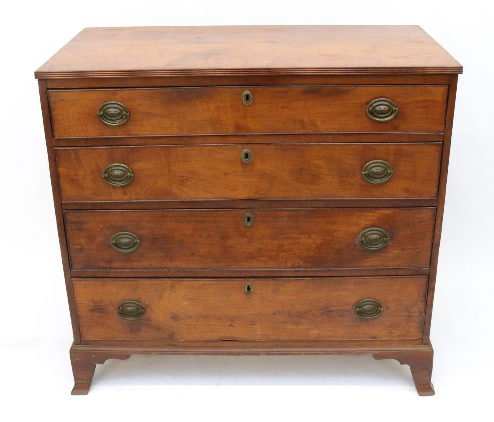 18TH CENTURY CHERRY CHIPPENDALE CHEST: NEW ENGLAND STYLE FOUR GRADUATED DRAWER CHERRY CHEST WITH EARLY BRASS HARDWARE AND BRACKET FEET SIZE: 37 1/2" X 40" X 20"