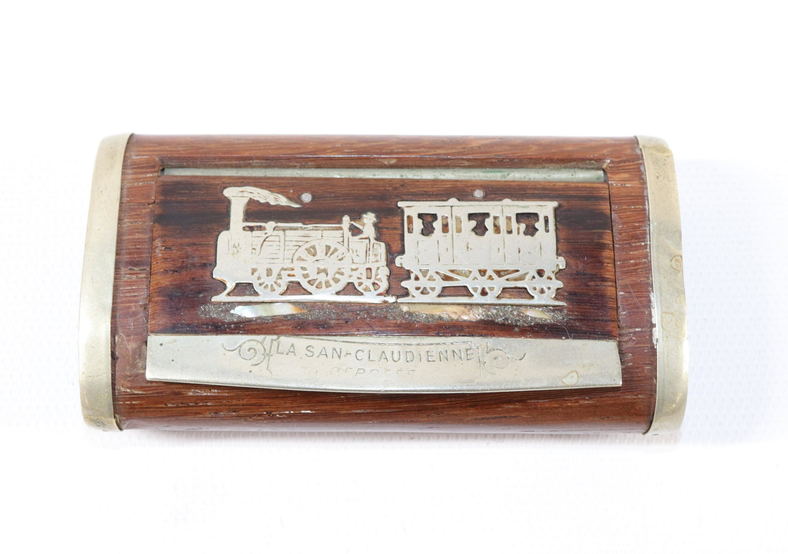 19TH CENTURY TOBACCO BOX: ROSEWOOD BOX WITH SILVER OVERLAY AND MOTHER OF PEARL INLAY - "LA SAN CLAUDIENNE REPOSES" DEPICTING STEAM ENGINE WITH COACH CAR SIZE: 3 1/4" X 1 3/4"