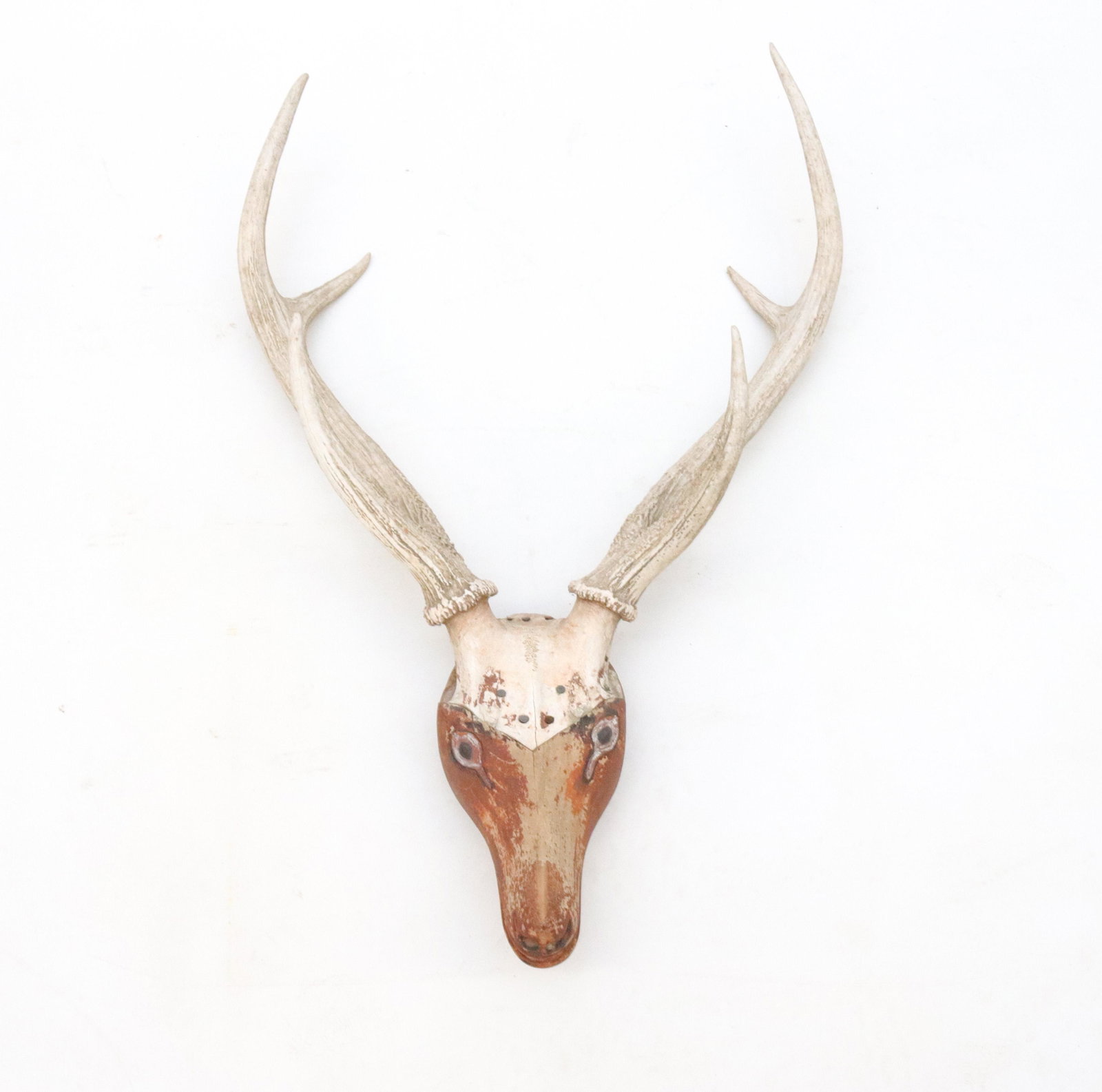 FOLK ART PAINTED WOODEN SKULL WITH ANTLERS: CARVED WOODEN HEAD WITH REAL SKULL AND ANTLETS - PAINTED SURFACE SIZE: 354" X 22"