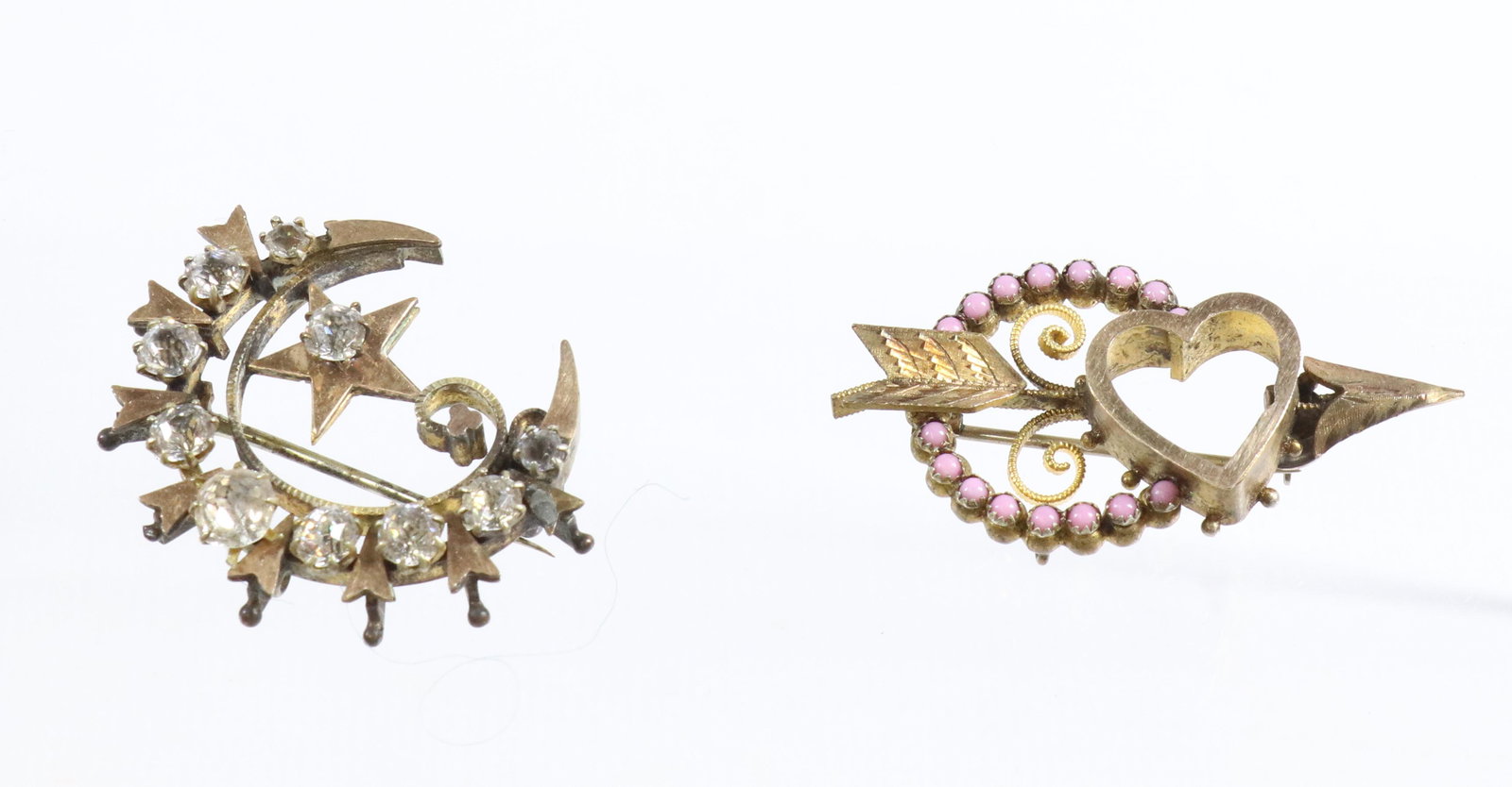 TWO VICTORIAN BROOCHES: CRESCENT AND STAR WITH PASTE STONES, HEART AND ARROW WITH PINK STONES- GOLD FILLED