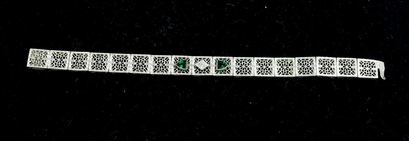 1920'S FILIGREE BRACELET: EMERALD AND WHITE PASTE STONES, NICKEL SETTING, INTERESTING CATCH