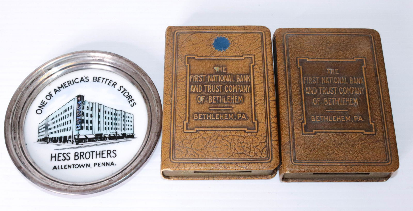 ALLENTOWN AND BETHLEHEM ADVERTISING LOT: INCLUDING - HESS BROTHERS ADVERTISING COASTER - ALLENTOWN, PA AND (2) FIRST NATIONAL BANK OF BETHLEHEM BOOK SHAPED BANKS