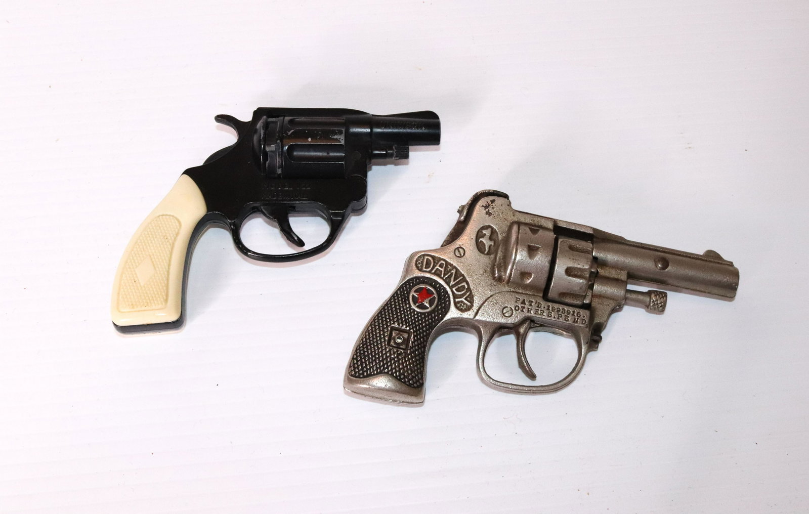 PR. OF CHILDRENS TOY CAP GUNS: HUBLEY "DANDY" POLICE 38 AND MODEL V22 MADE IN ITALY