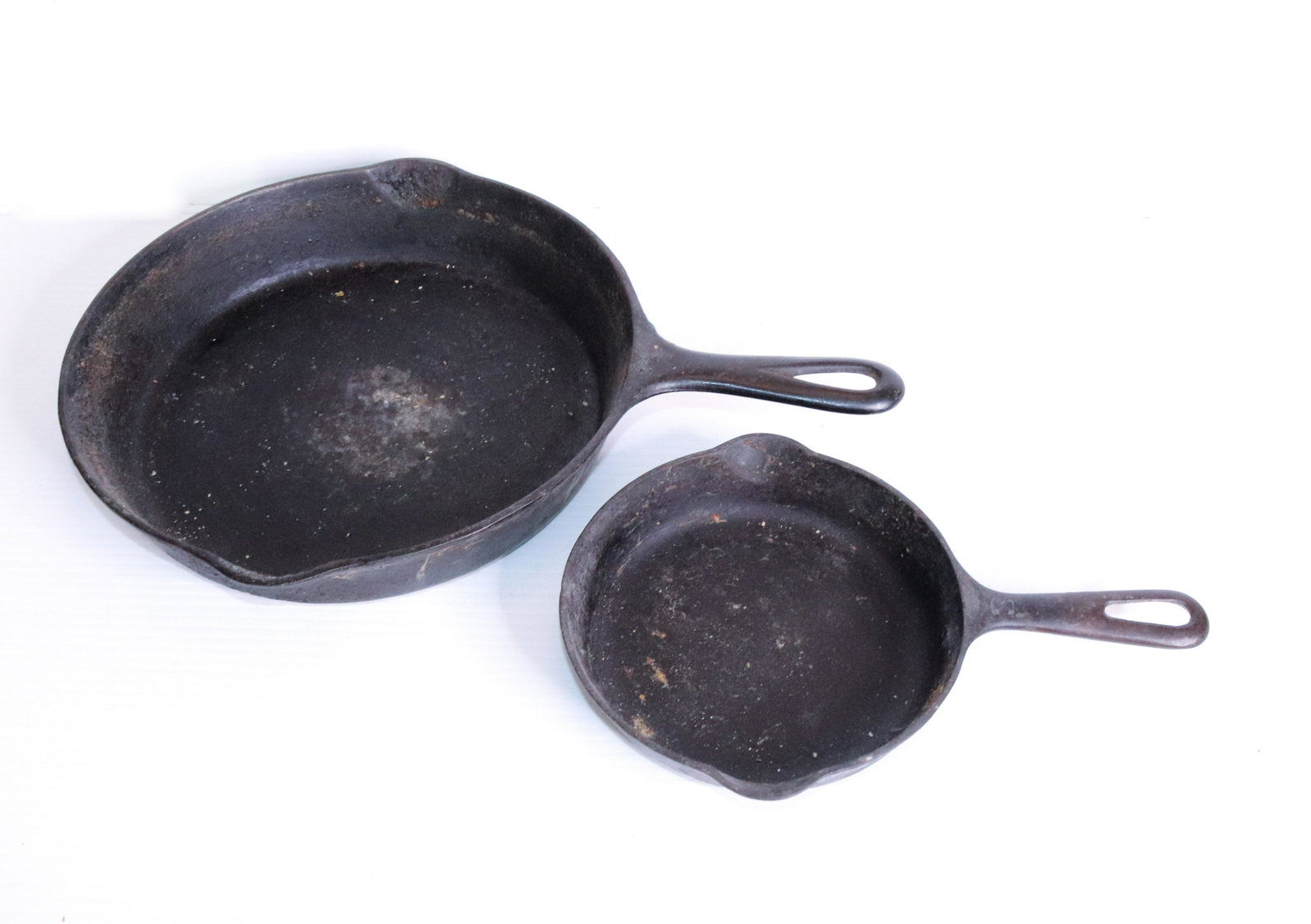 PR. OF GRISWOLD CAST IRON PANS: #3 AND POSSIBLY #8