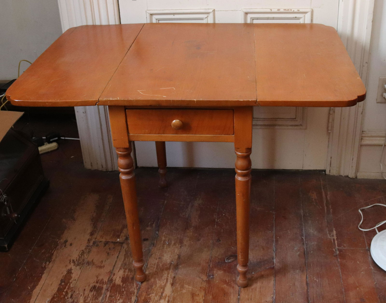 ANTIQUE DROP LEAF TABLE: CHERRY TABLE WITH SINGLE DRAWER, TURNED LEGS, AND DROP LEAF SIDES