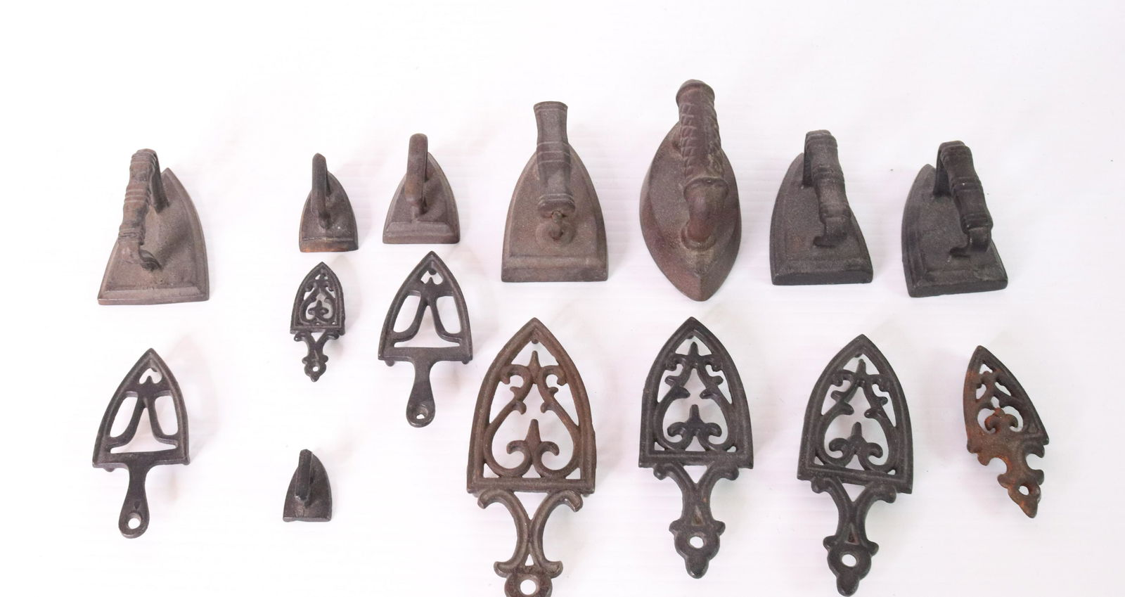 GROUP LOT OF MINIATURE IRONS WITH TRIVETS (1 of 2)