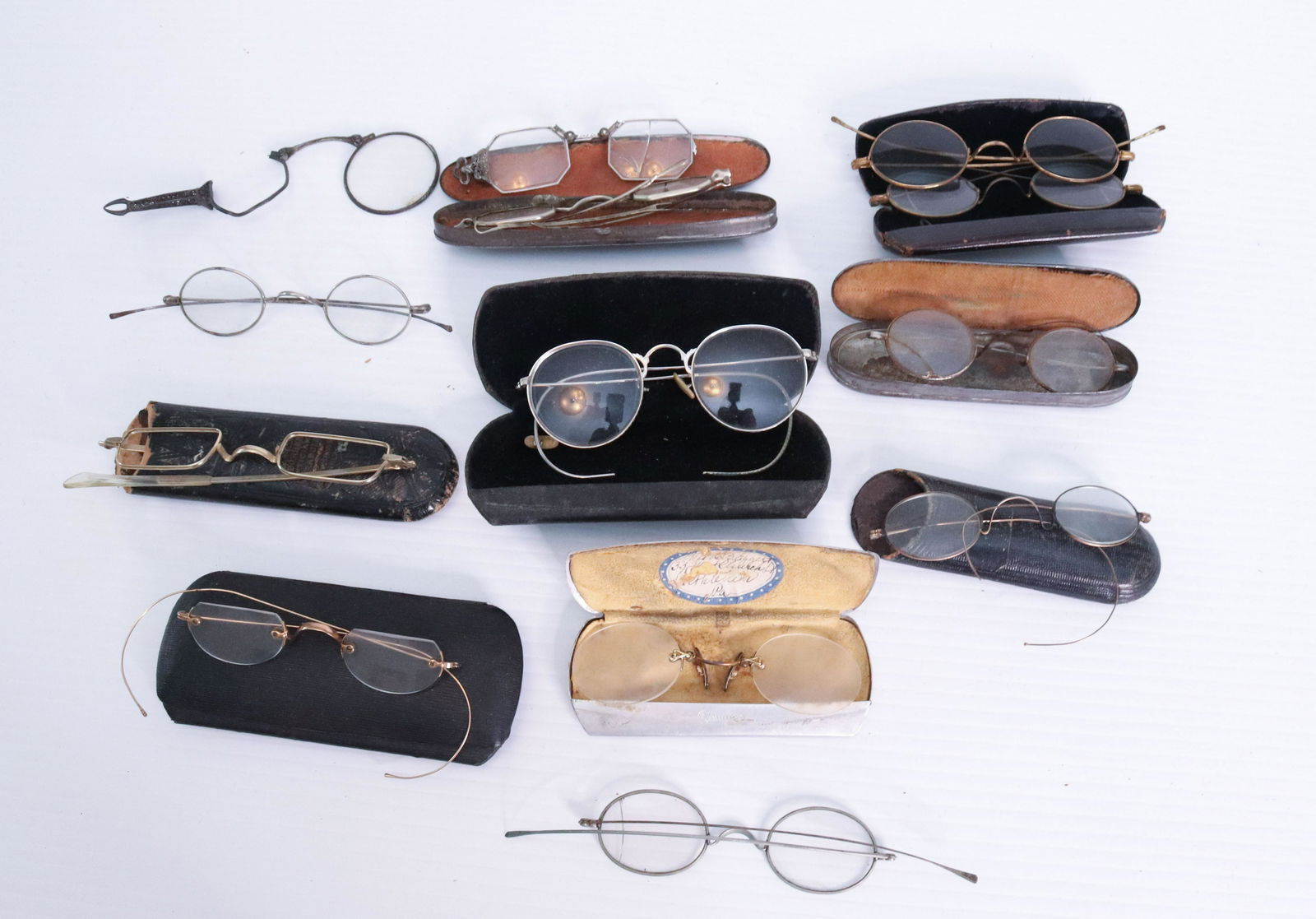 ANTIQUE EYEGLASS LOT: (10) PAIRS INCLUDING - ONE MARKED 10K TERMS: THIS SALE WILL BE ONLINE ONLY. PICK-UP WILL BE ON-SITE AT 14 CHURCH ST. BETHLEHEM, PA 18018 - APPOINTMENTS WILL BE MADE AS PARKING IS VERY LIMITED - PICK-U