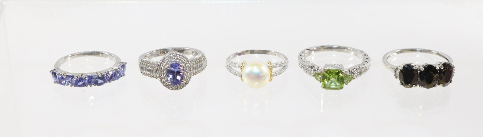 CONTEMPORARY STERLING SILVER RING LOT: 5 RINGS-TANZANITE, CULTURED PEARL, ONYX, PERIDOT SIZE: 10,9,8(3)