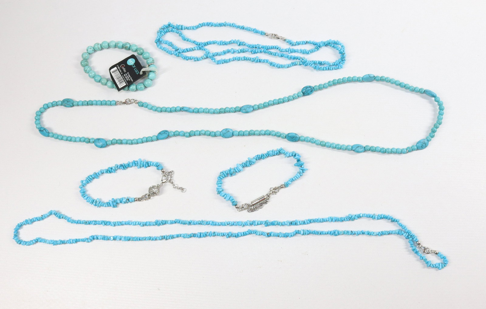 CONTEMPORARY TURQUOISE JEWELRY: LONG STRAND AND BRACELET POLISHED BEADS, 2 BRACELETS, 2 STRANDS NUGGET BEADS SIZE: 35"