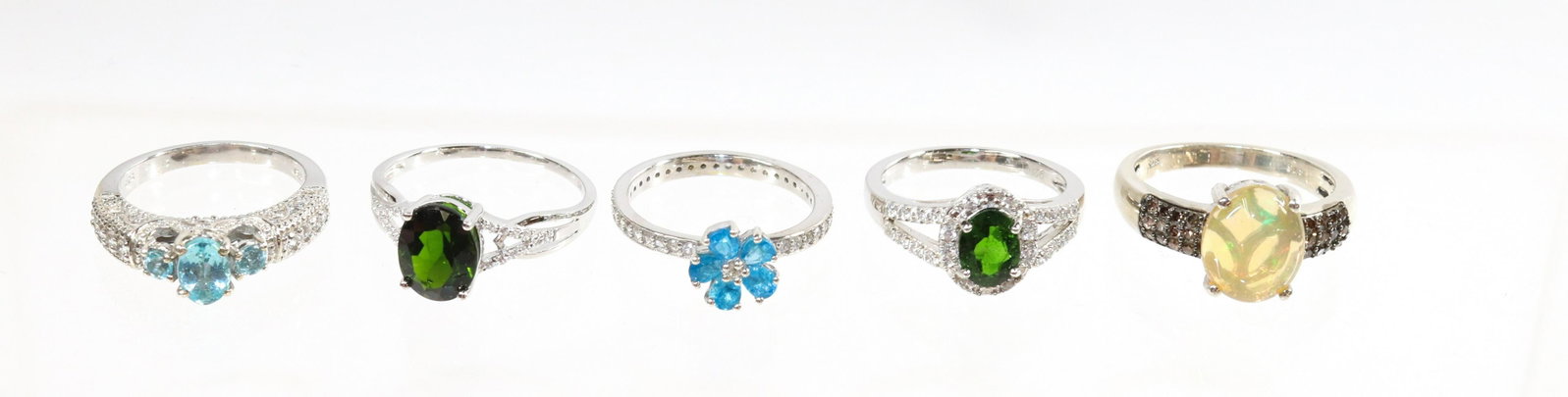 CONTEMPORARY STERLING SILVER RING LOT: 5 RINGS- WATER OPAL, TOPAZ, 2 EMERALD SPINELS SIZE: SIZE-8(3), 10(2)