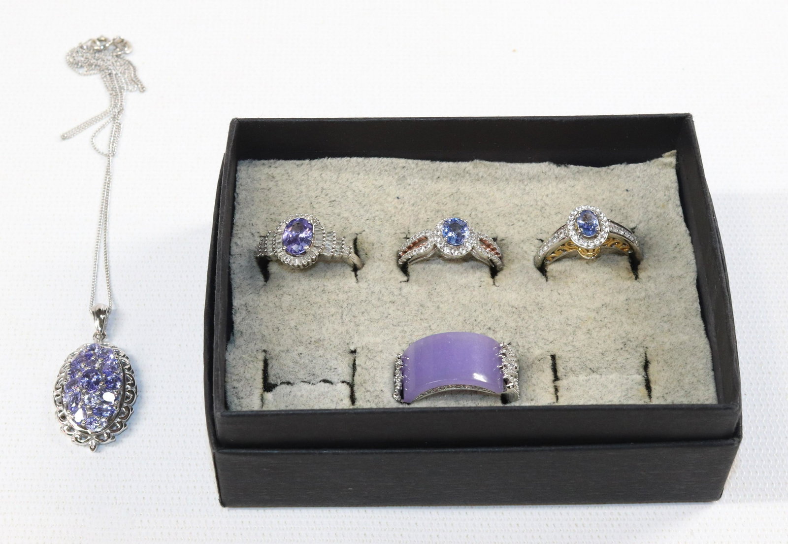CONTEMPORARY STERLING SILVER JEWELRY LOT: TANZANITE LOT-NECKLACES, 4 RINGS .8 OZT SIZE: SIZE-8 NECKLACE-18"