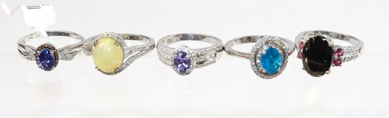 CONTEMPORARY STERLING SILVER RING LOT: 5 RINGS- OPAL, ONYX, TANZANITE, BLUE TOPAZ SIZE: SIZE- 9(2), 10(3)