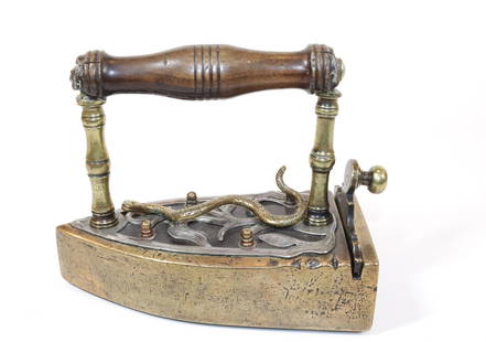 Exquisite Example of a Rare German 18th Century Box: Brass, Iron, and Steel Cutout Decoration. With Raised Finley Crafted Snake over Vine. Vertical Lift Gate, Turned Brass Posts and Original Wooden Handle Size 6 1/4" x 7 7/8" x 3 3/4"