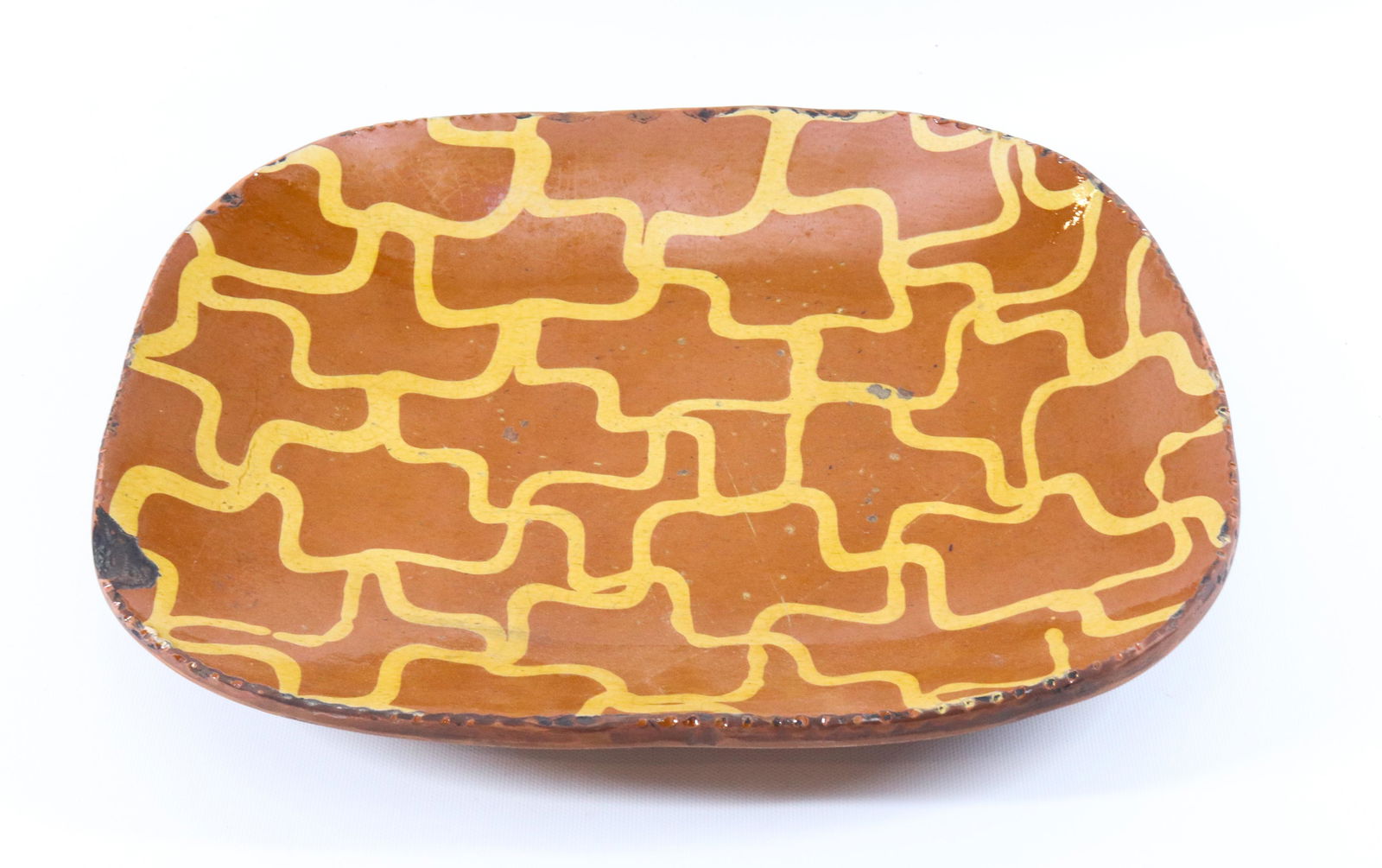 19TH CENTURY REDWARE LOAF PAN: YELLOW WARE SLIP GRID DESIGN, COGGLED EDGE Dimensions 11" X 14" PLEASE READ BEFORE BIDDING – PICKUP FOR THIS AUCTION WILL NOT BE UNTIL THE WEEK OF OCTOBER 25TH. PICK-UP WILL BE FROM 9:00AM TILL