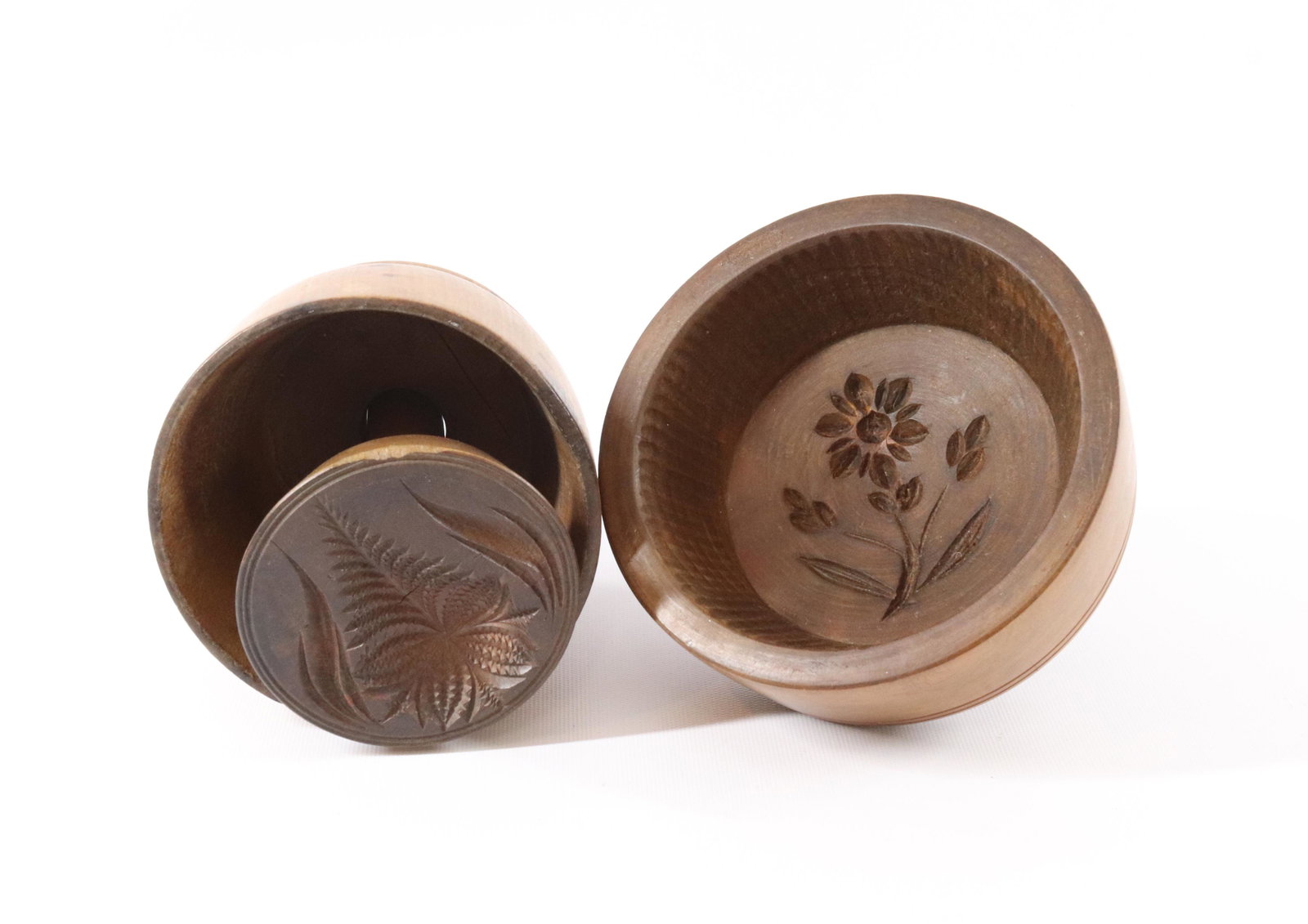 PR. OF WOODEN BUTTER STAMPS: SINGLE PIECE FLORAL MOLD AND TWO-PIECE LEAF MOLD Dimensions 4 3/4" TO 5 3/4" D PLEASE READ BEFORE BIDDING – PICKUP FOR THIS AUCTION WILL NOT BE UNTIL THE WEEK OF OCTOBER 25TH. PICK-UP WILL BE FR
