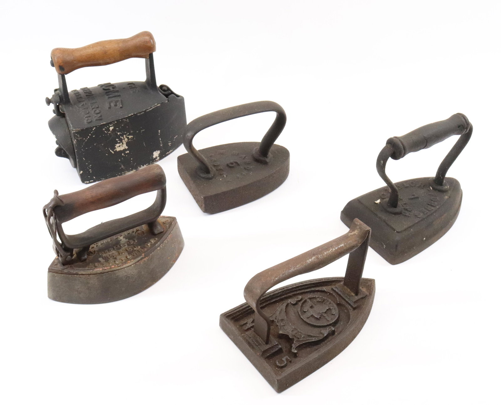 LOT OF ANTIQUE IRONS: (5) INCLUDING - SAD IRON, TROY NEW YORK SAD IRON, WROUGHT IRON WITH EMBOSSED TOP, DETACHABLE HANDLE IRON, AND ACME CHARCOAL IRON Dimensions PLEASE READ BEFORE BIDDING – PICKUP FOR THIS AUCTION W