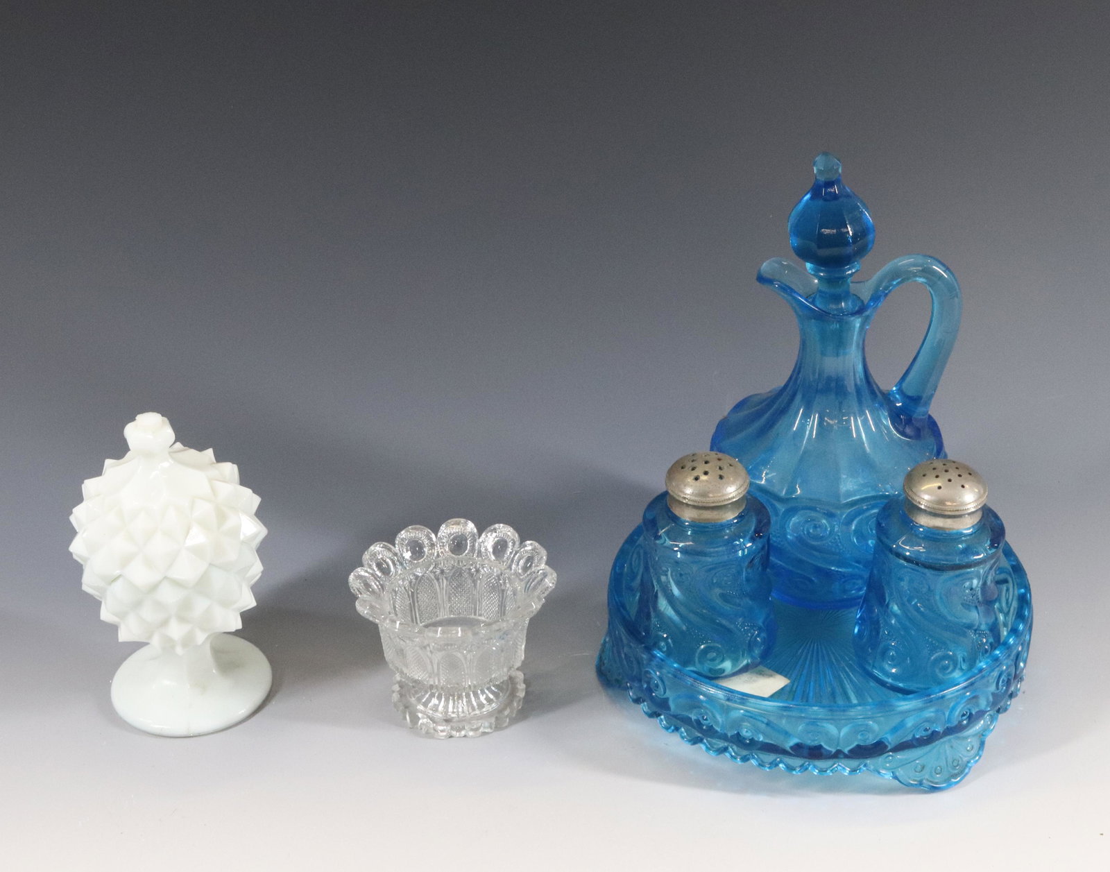 COLORED PATTERNS GLASS LOT: ELECTRIC BLUE SYRUP, SALT AND PEPPER AND FOOTED TRAY, SAWTOOTH COVERED EGG CUP, AND FRENCH LACY MATER SALT Dimensions SYRUP 8" - LACY SALT 2 1/4" PLEASE READ BEFORE BIDDING – PICKUP FOR THIS AUC