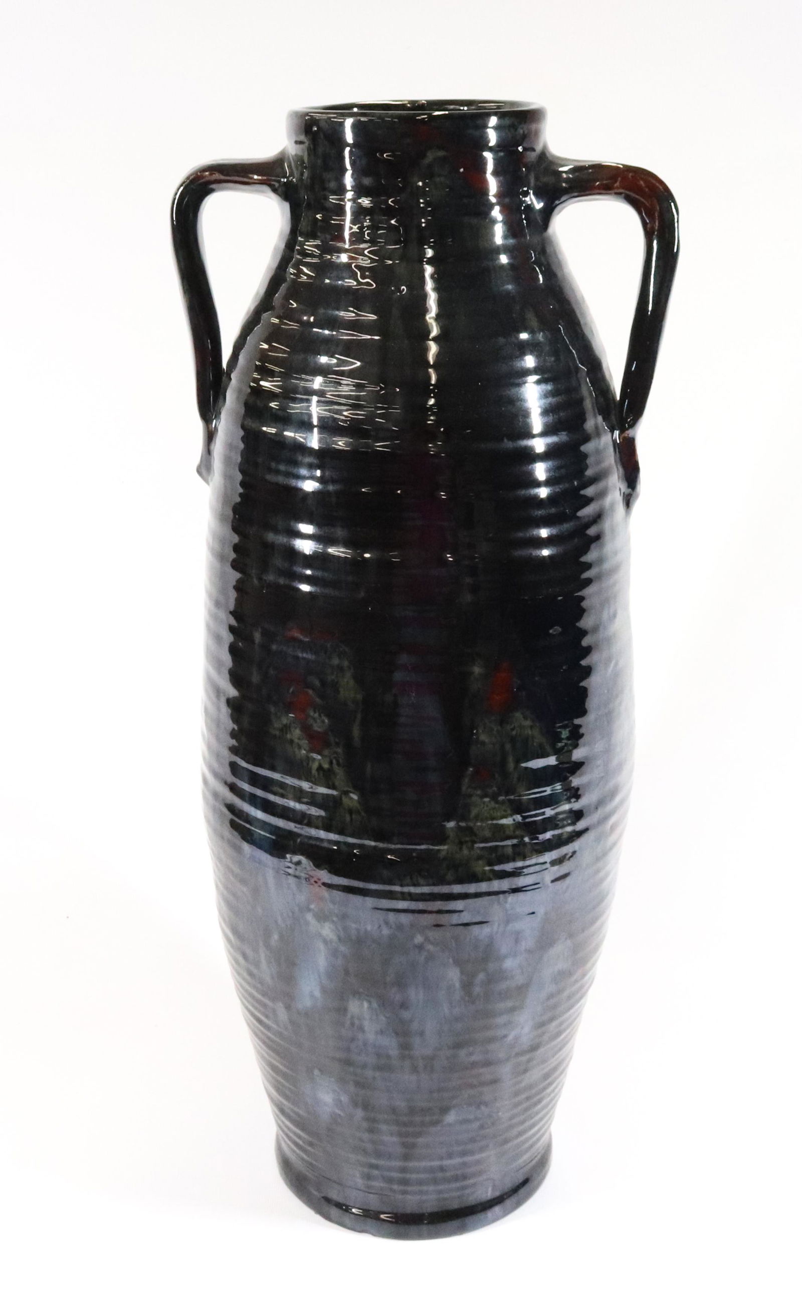 FULPER TALL POTTERY VASE: COLONIAL WARE VASE CIRCA 1920, DRIP GLAZE WITH COBALT AND RED - DOUBLE HANDLE SIZE: 22 1/2" X 9" PLEASE READ BEFORE BIDDING – PICKUP FOR THIS AUCTION WILL NOT BE UNTIL THE WEEK OF OCTOBER 25TH. PICK