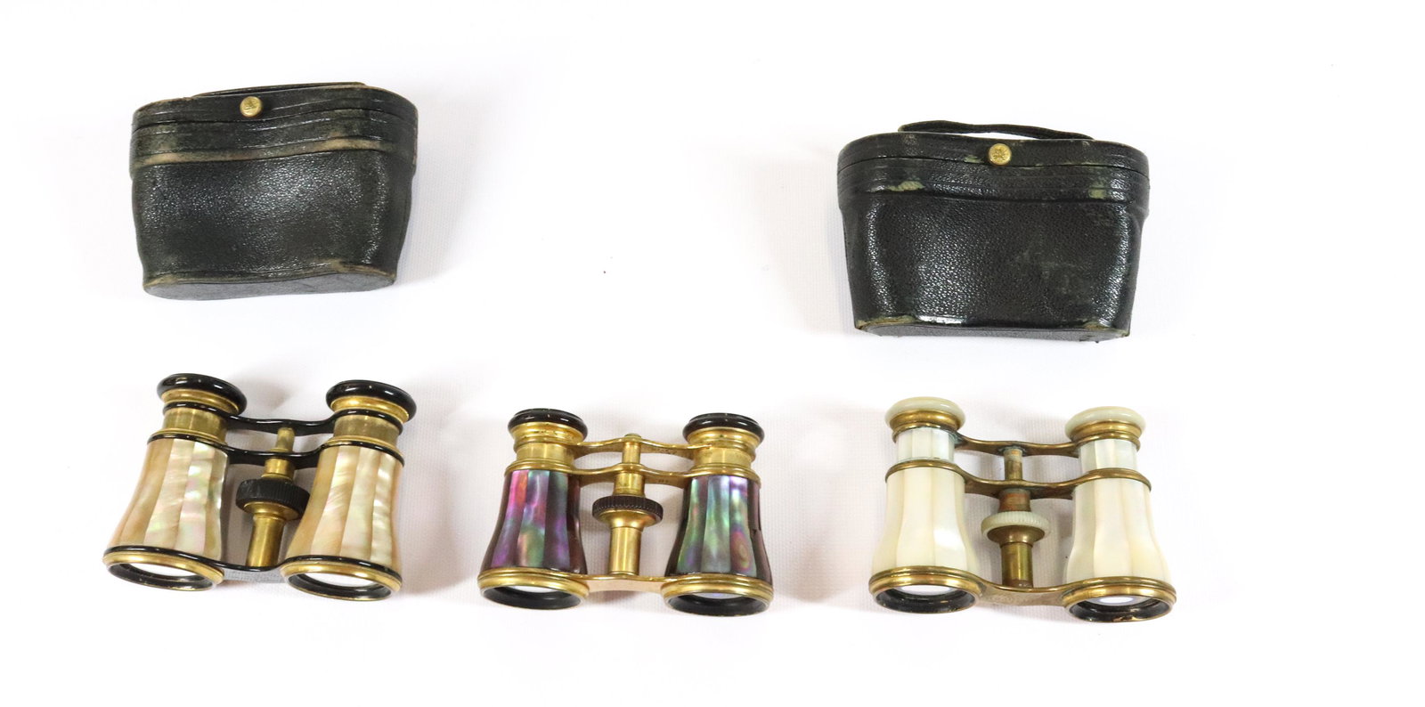 OPERA GLASS LOT: (3) PAIRS OF OPERA GLASSES WITH MOTHER OF PEARL - (2) CASES SIZE: 2 1/2" X 4" PLEASE READ BEFORE BIDDING – PICKUP FOR THIS AUCTION WILL NOT BE UNTIL THE WEEK OF OCTOBER 25TH. PICK-UP WILL BE FROM 9: