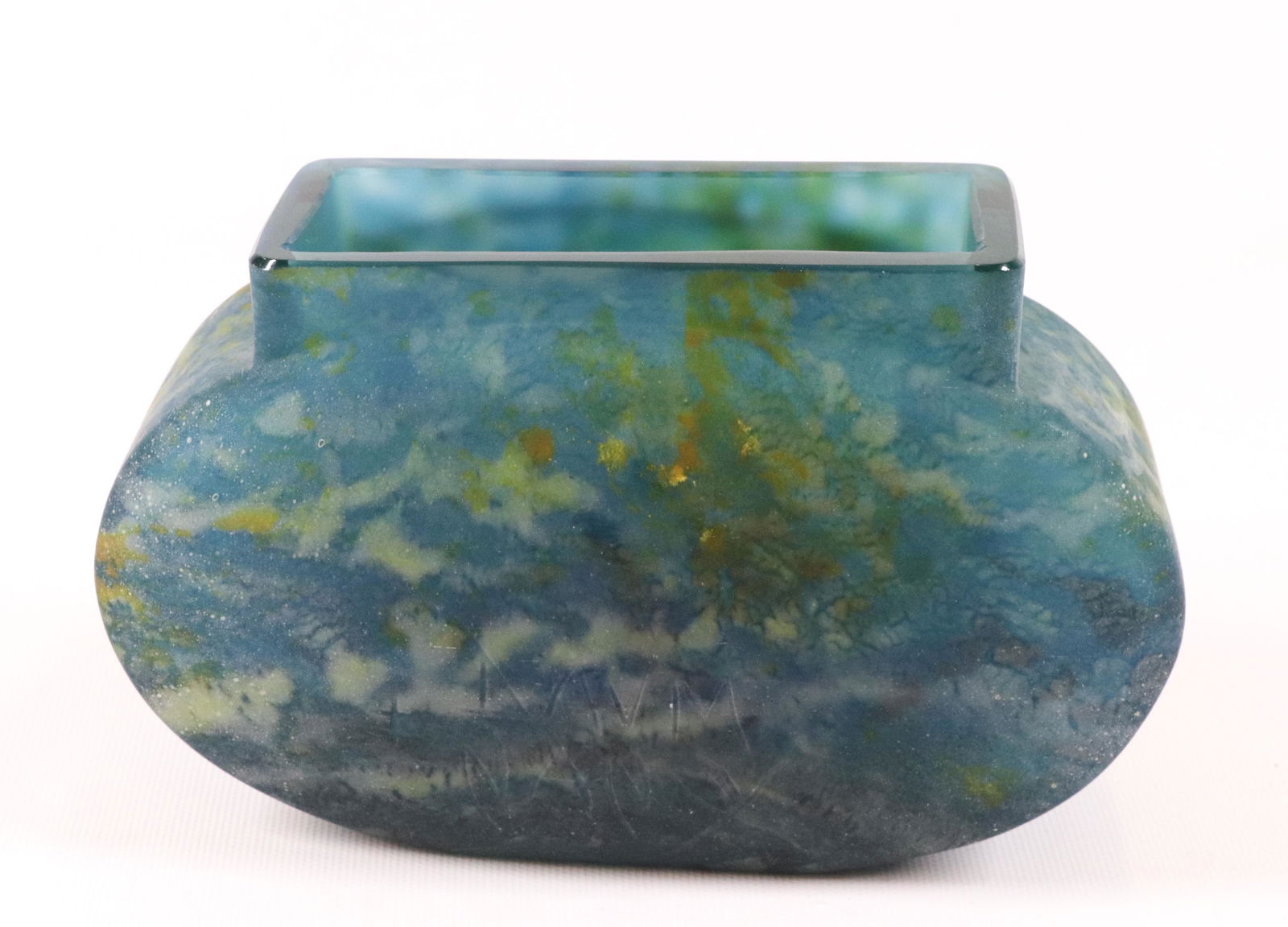 DAUM NANCY ART GLASS "PILLOW" VASE: OPAQUE BLUE-GREEN, SIGNED ON BROAD SIDE WITH LOGO SIZE: 4 1/2" X 7" PLEASE READ BEFORE BIDDING – PICKUP FOR THIS AUCTION WILL NOT BE UNTIL THE WEEK OF OCTOBER 25TH. PICK-UP WILL BE FROM 9:00AM TILL