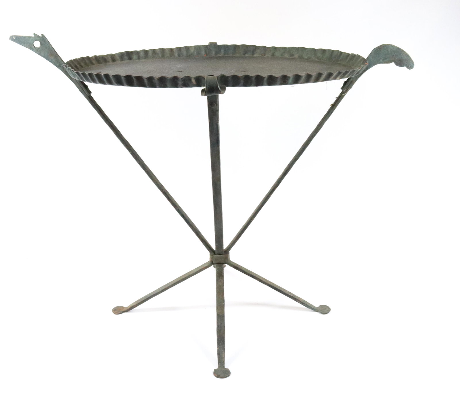 PAINTED METAL SIDE TABLE: CRIMPED EDGE OVAL TOP SET IN FOUR LEGS. ANIMAL HEAD AND TAIL. PAINTED SURFACE SIZE: 22 1/2" X 29" X 18" PLEASE READ BEFORE BIDDING – PICKUP FOR THIS AUCTION WILL NOT BE UNTIL THE WEEK OF OCTOBER 25T