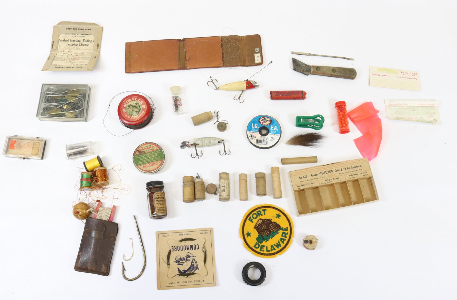 VINTAGE FISHING TRAY LOT: (2) EARLY WOODEN LURES - PAPER GOODS AND OTHER ITEMS