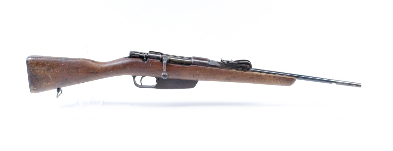 CARCANO MODEL 1938: 6.5 CAL - SERIAL# VG5221 - CARTOUCHE MARK ON STOCK SIZE: 18" BARREL REGISTRATION: THIS FIREARM IS REQUIRED TO BE REGISTERED. WE WILL NEED A COPY OF YOUR FFL OR 3RD PARTY YOU WISH TO USE TO TRANSFER. A